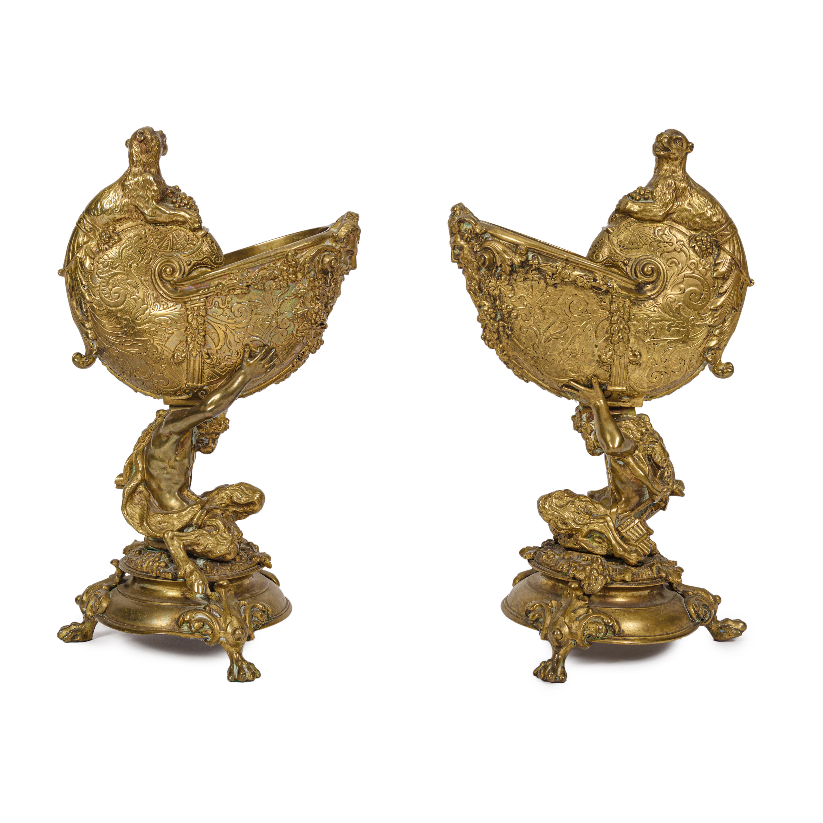 Appraisal: A PAIR OF GILT BRONZE FIGURAL TABLE CENTRES SATYR NAUTILUS