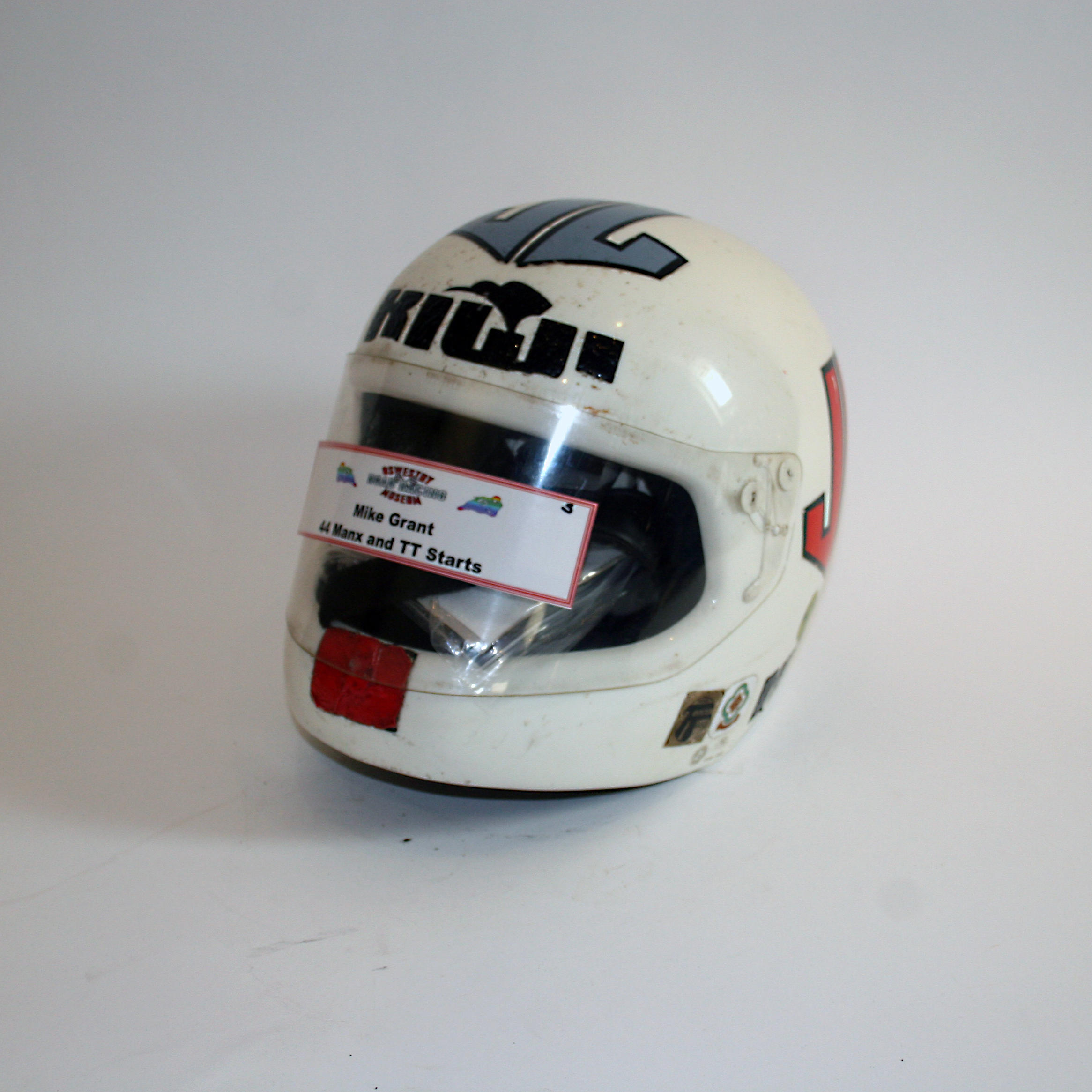 Appraisal: MICK GRANT A FULL-FACE HELMET BY KIWI SWISS MADE size