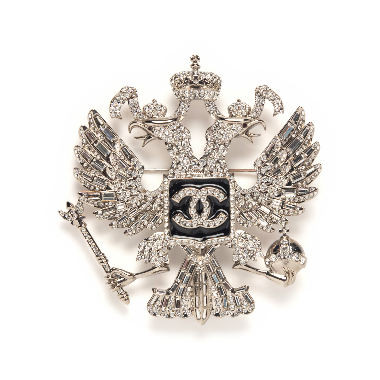 Appraisal: A CHANEL DOUBLE-HEADED EAGLE BROOCH Silver-tone double-headed eagle shaped brooch