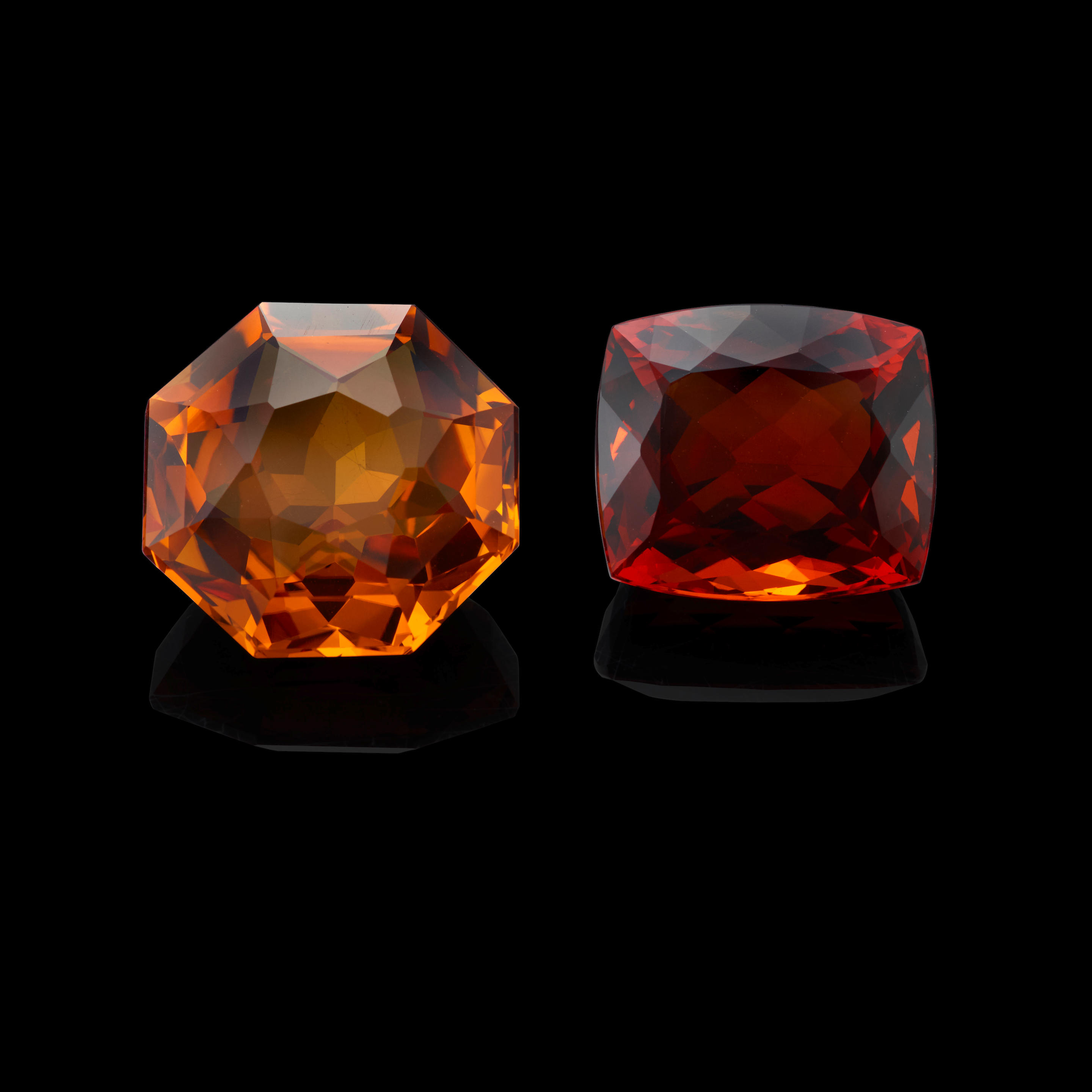 Appraisal: TWO CITRINES Brazil A fancy octagonal-cut citrine with golden orange