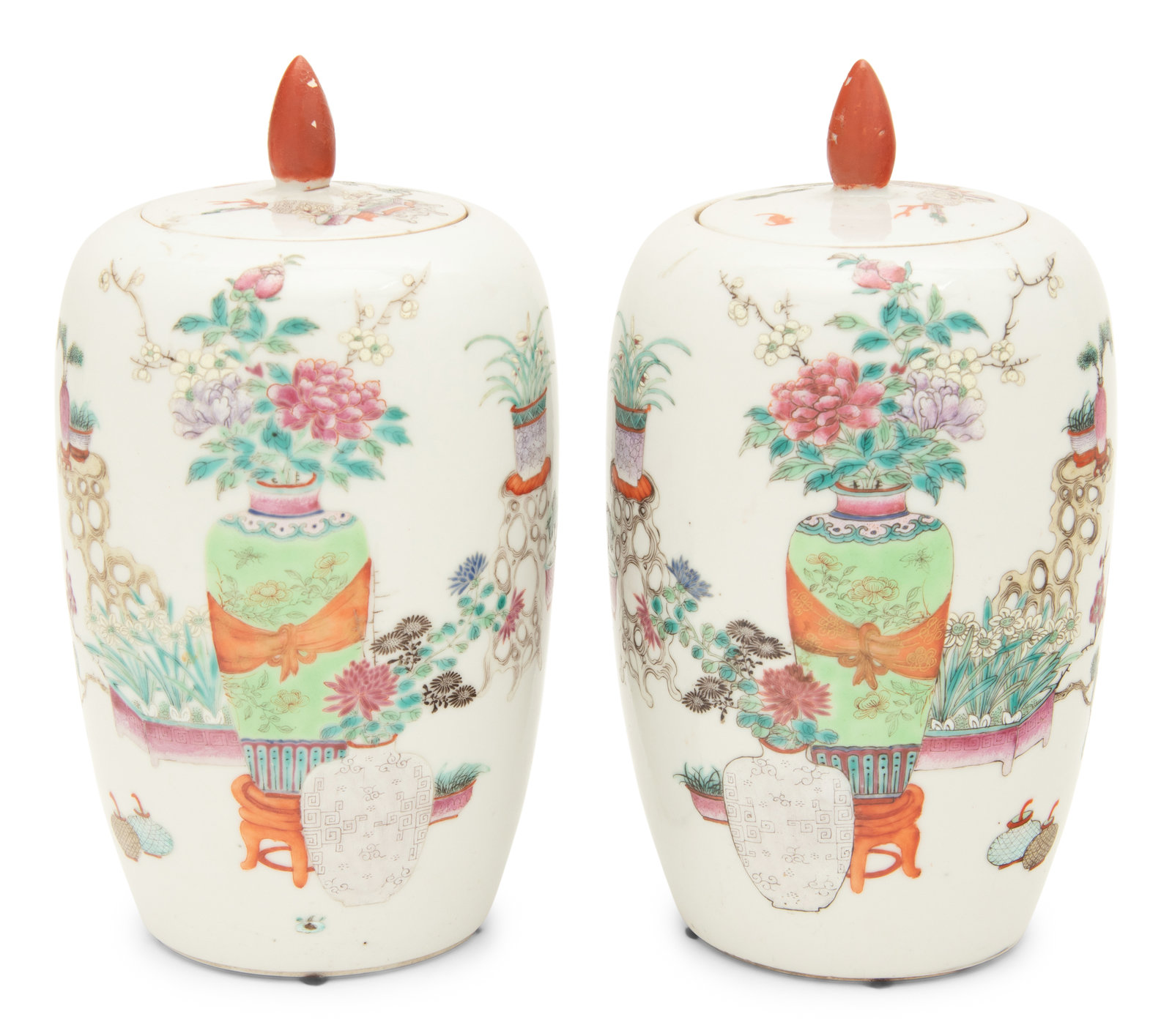 Appraisal: A Pair of Famille Rose Porcelain Ovoid Jars and Covers