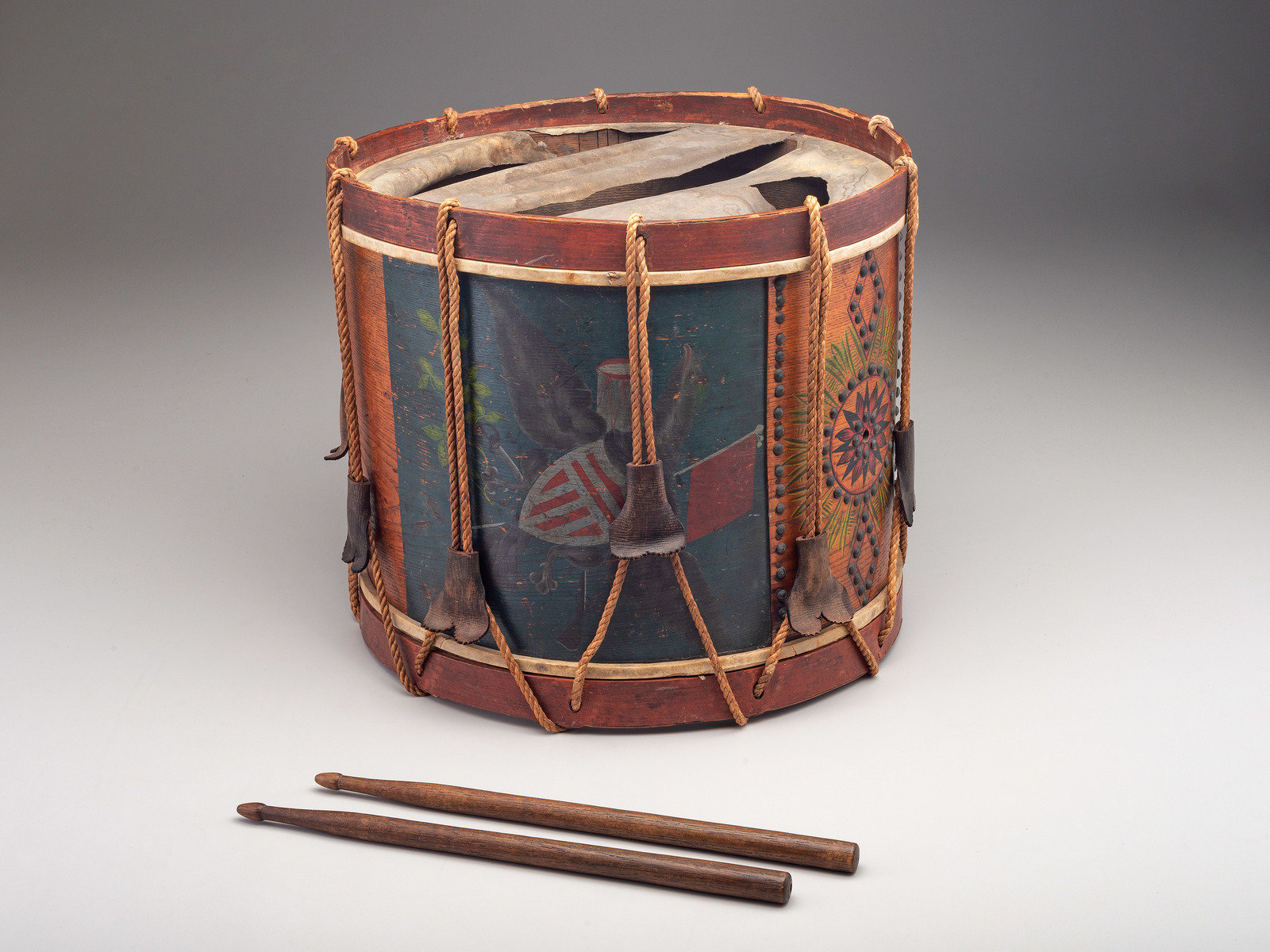 Appraisal: MILITARIA Possibly Mexican War painted drum featuring ornate tack design