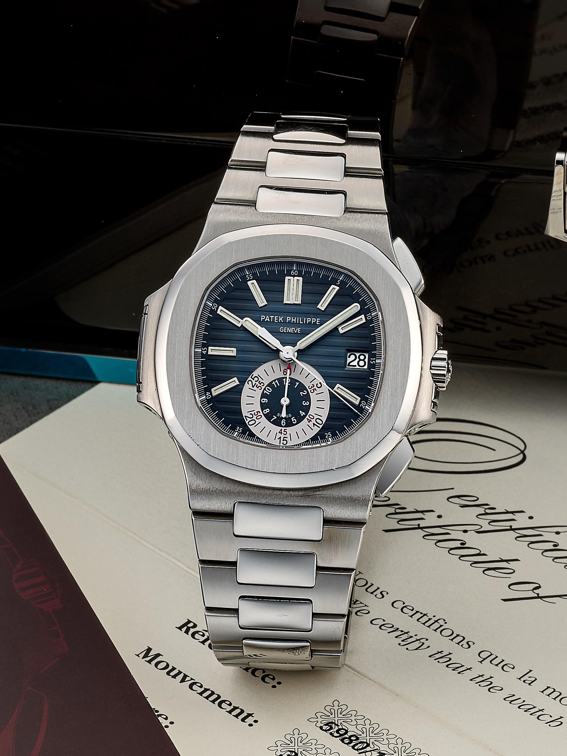 Appraisal: PATEK PHILIPPE NAUTILUS - GENEVA SEAL REF A- A STAINLESS