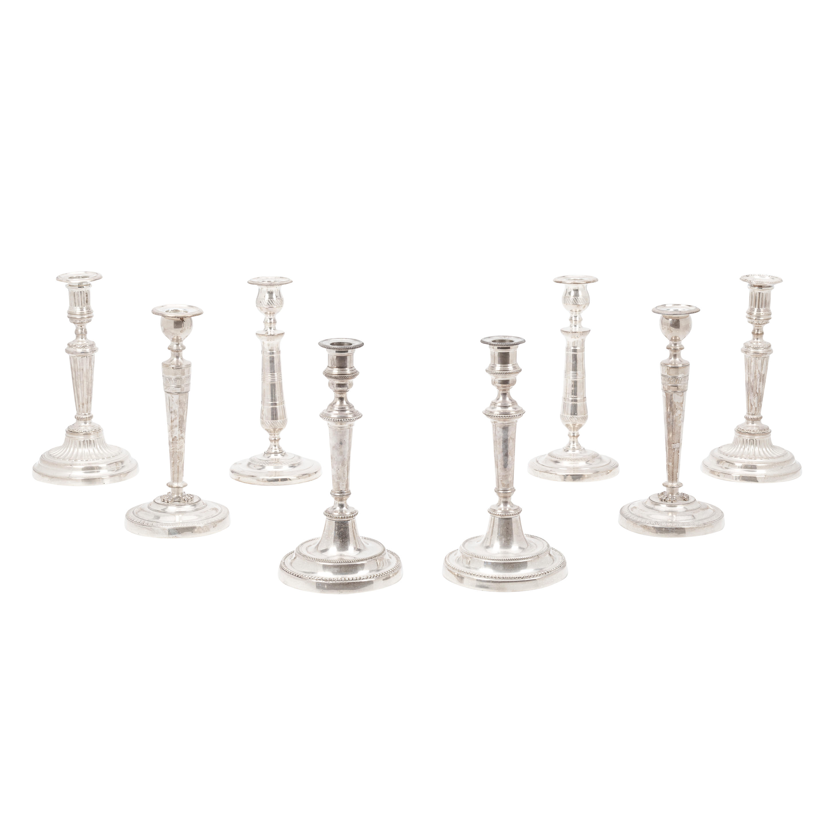 Appraisal: FOUR PAIRS OF SILVER-PLATED CANDLESTICKS unmarked probably French th century