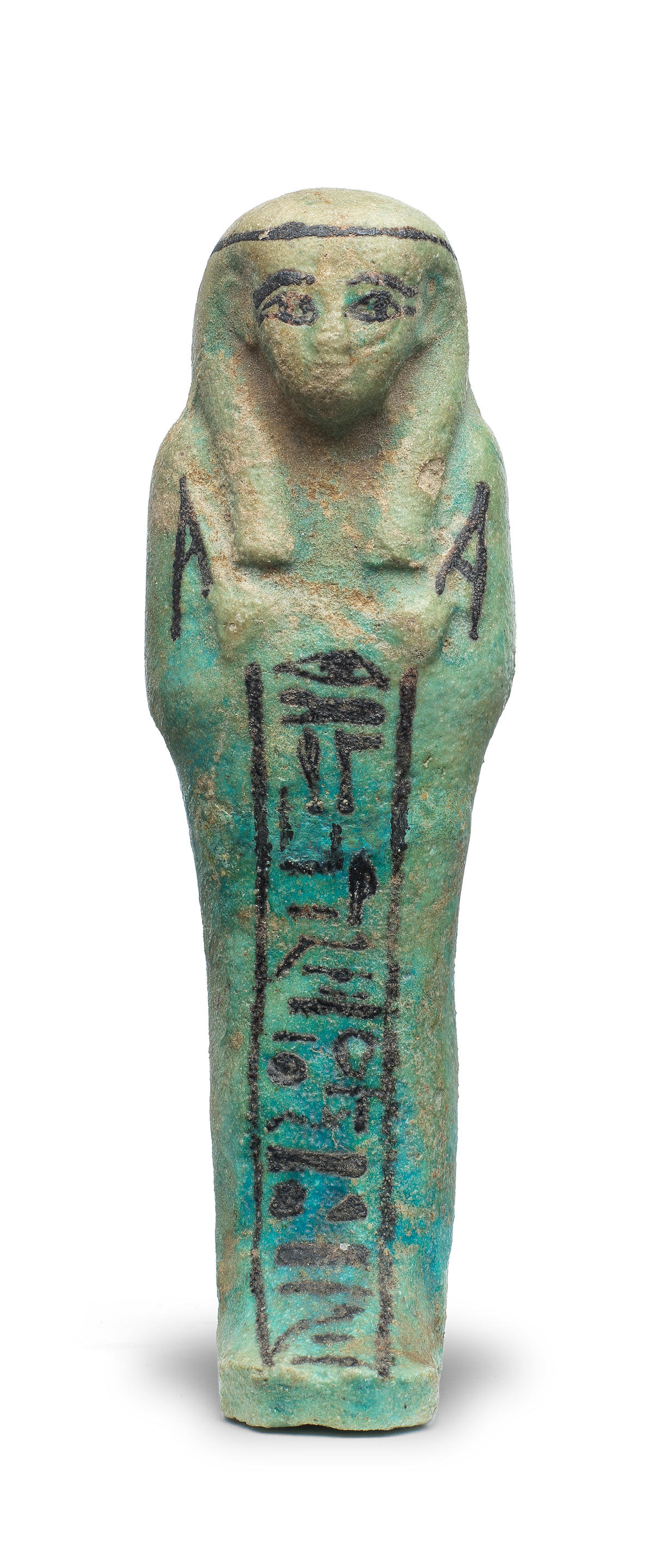 Appraisal: AN EGYPTIAN TURQUOISE GLAZED FAIENCE SHABTI FOR THE PRIEST OF