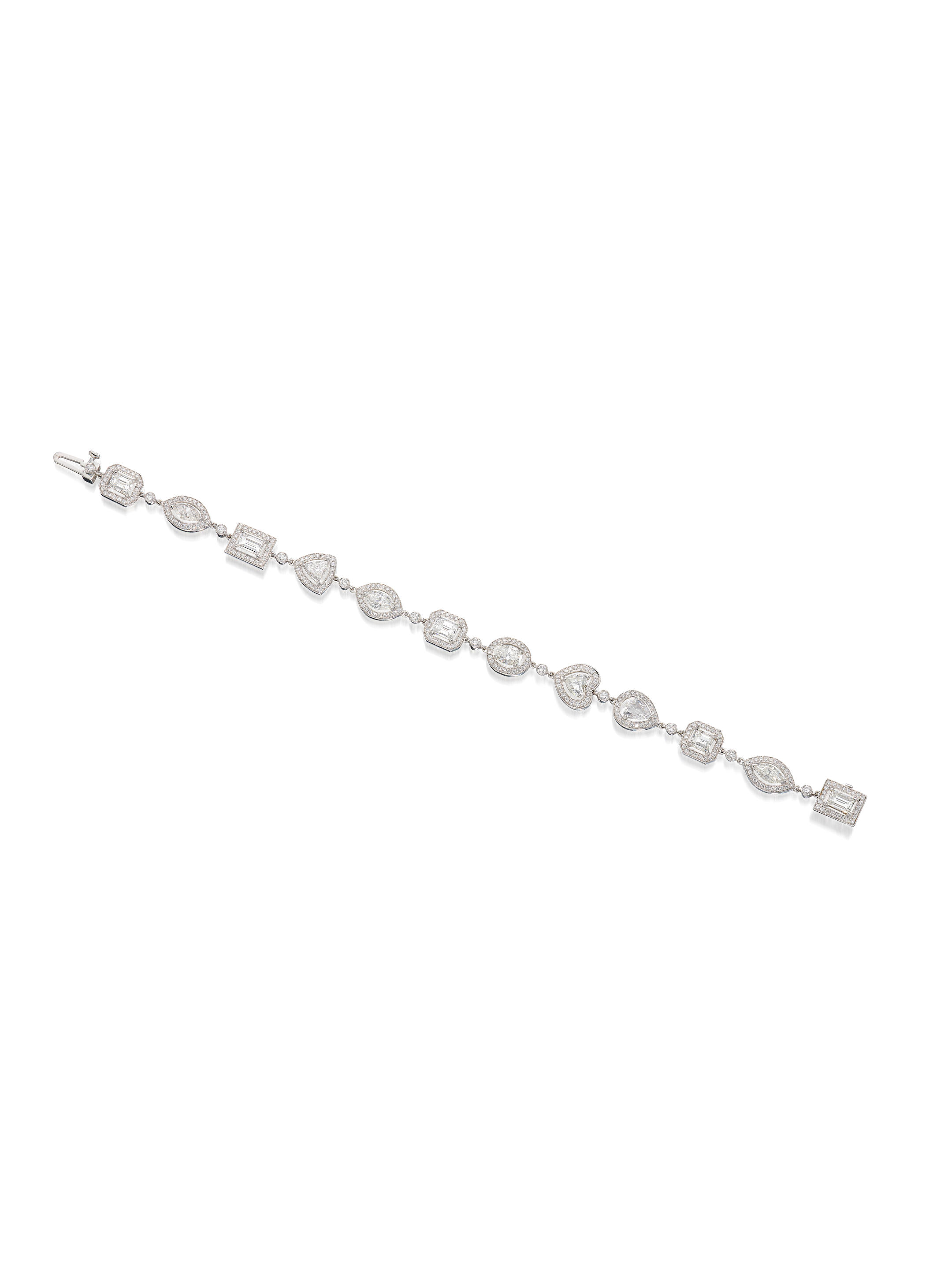 Appraisal: A DIAMOND BRACELET Set with a series of vari-cut diamonds