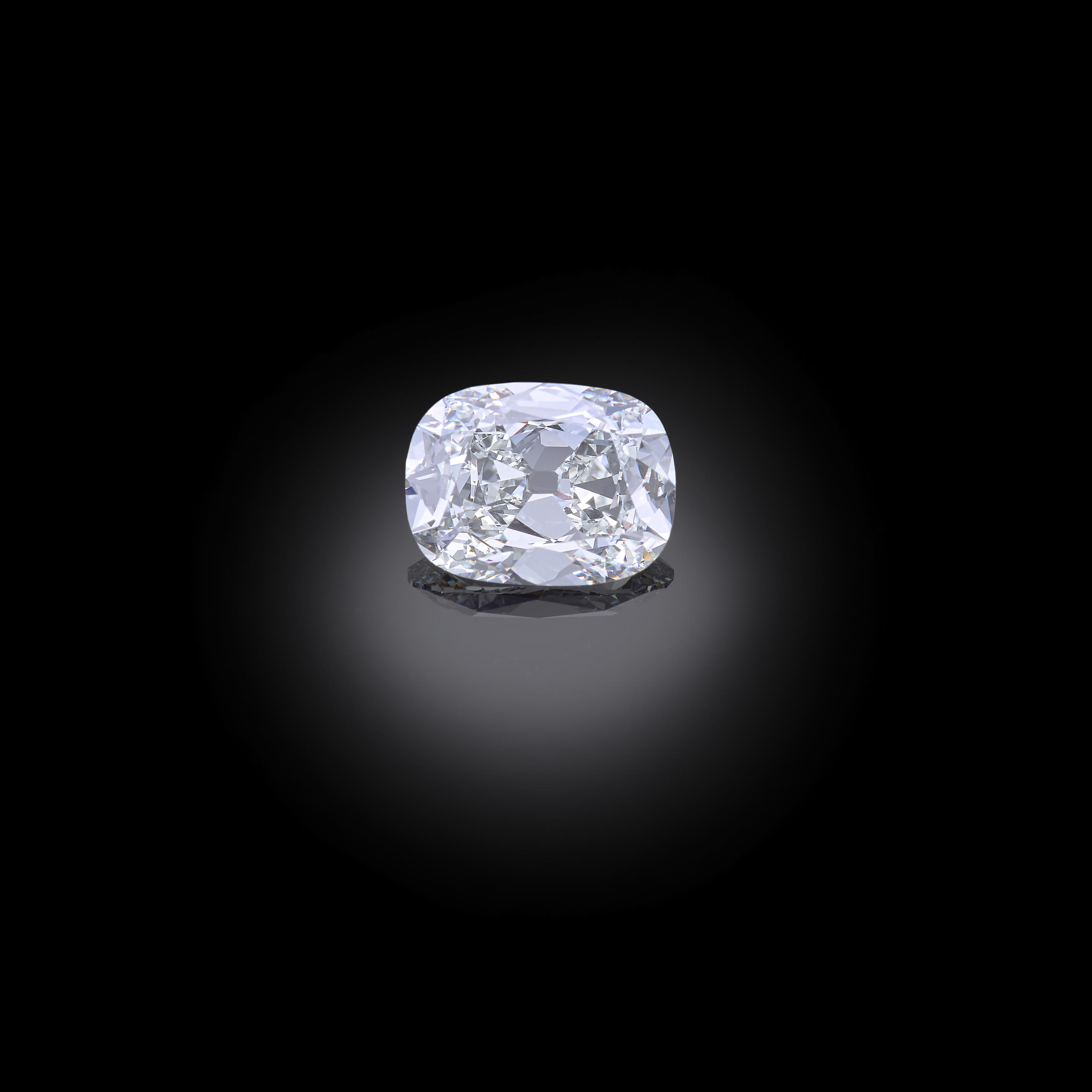 Appraisal: A LOOSE DIAMOND Of cushion-cut weighing carats