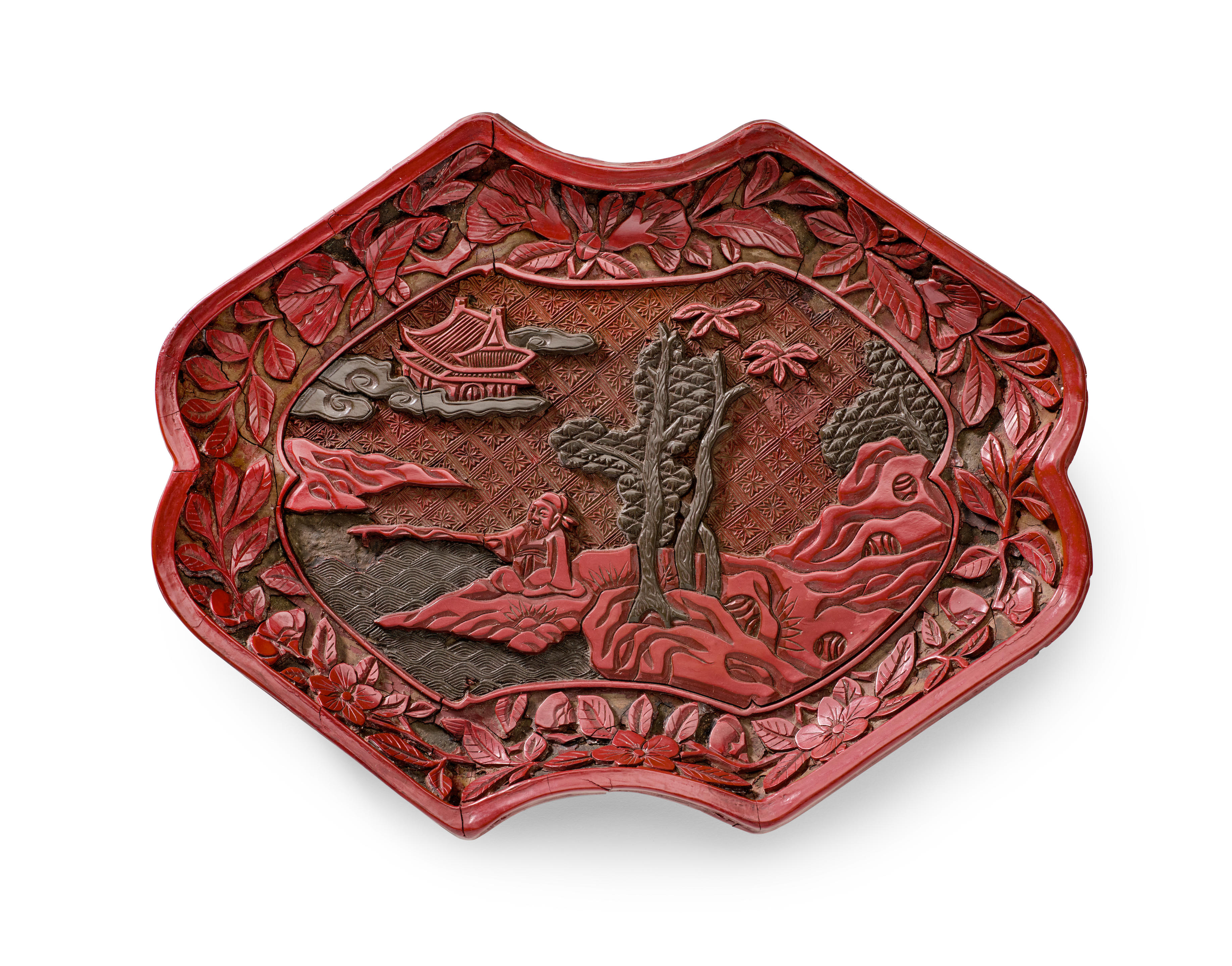 Appraisal: A CARVED CINNABAR AND GREEN LACQUER INGOT-SHAPED TRAY Hongwu mark