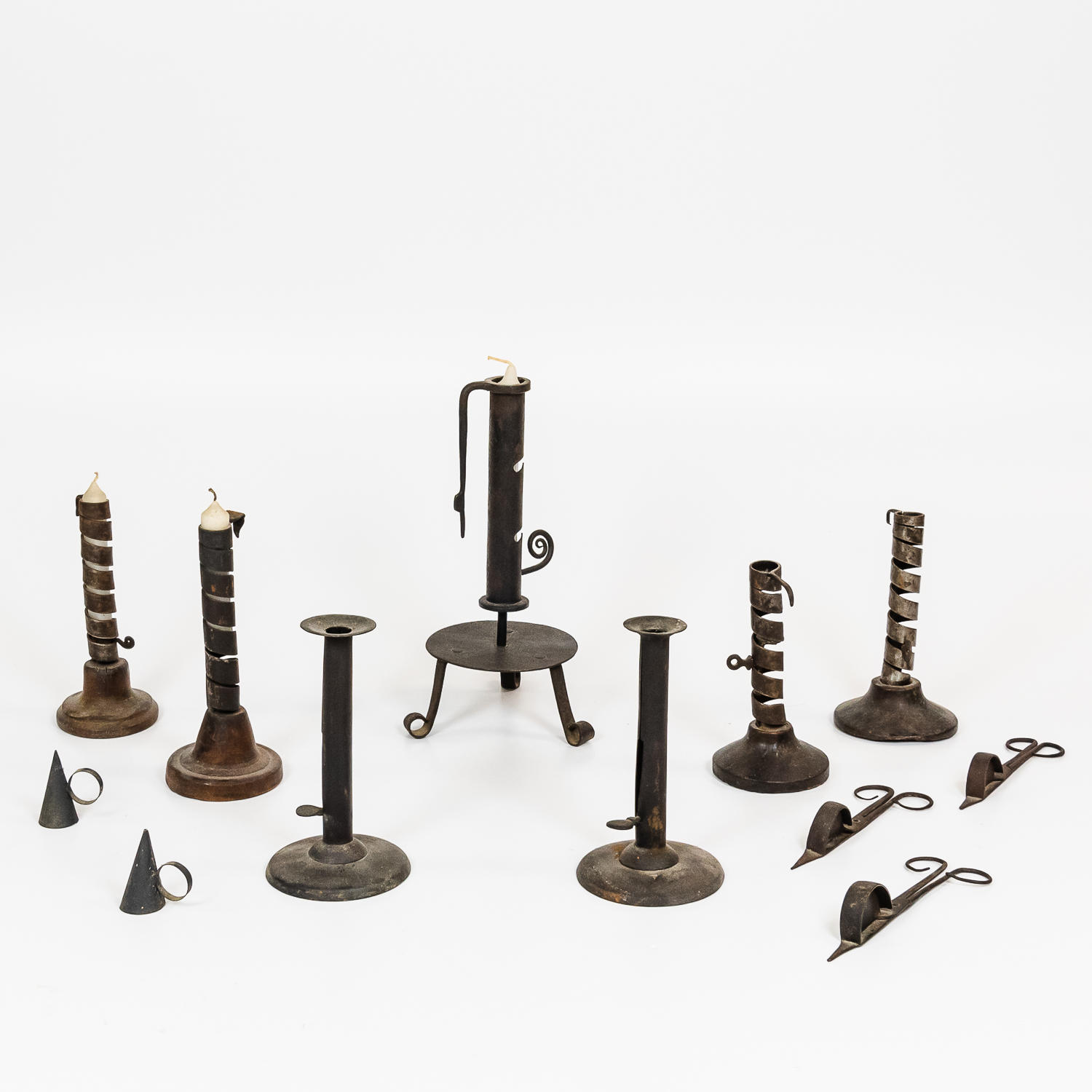 Appraisal: GROUP OF CAST IRON AND METAL LIGHTING IMPLEMENTS including seven