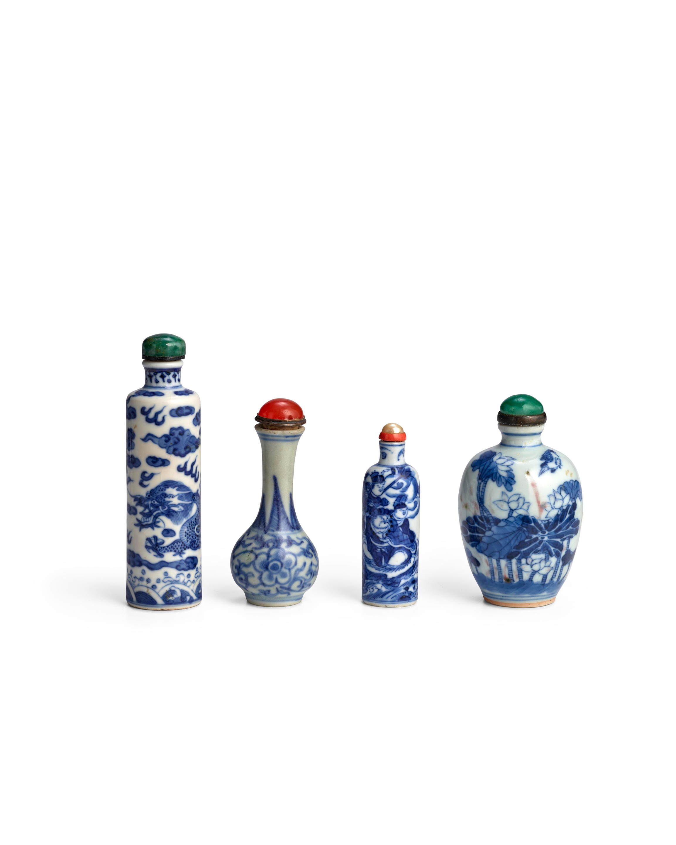 Appraisal: FOUR BLUE AND WHITE PORCELAIN BOTTLES One the second from