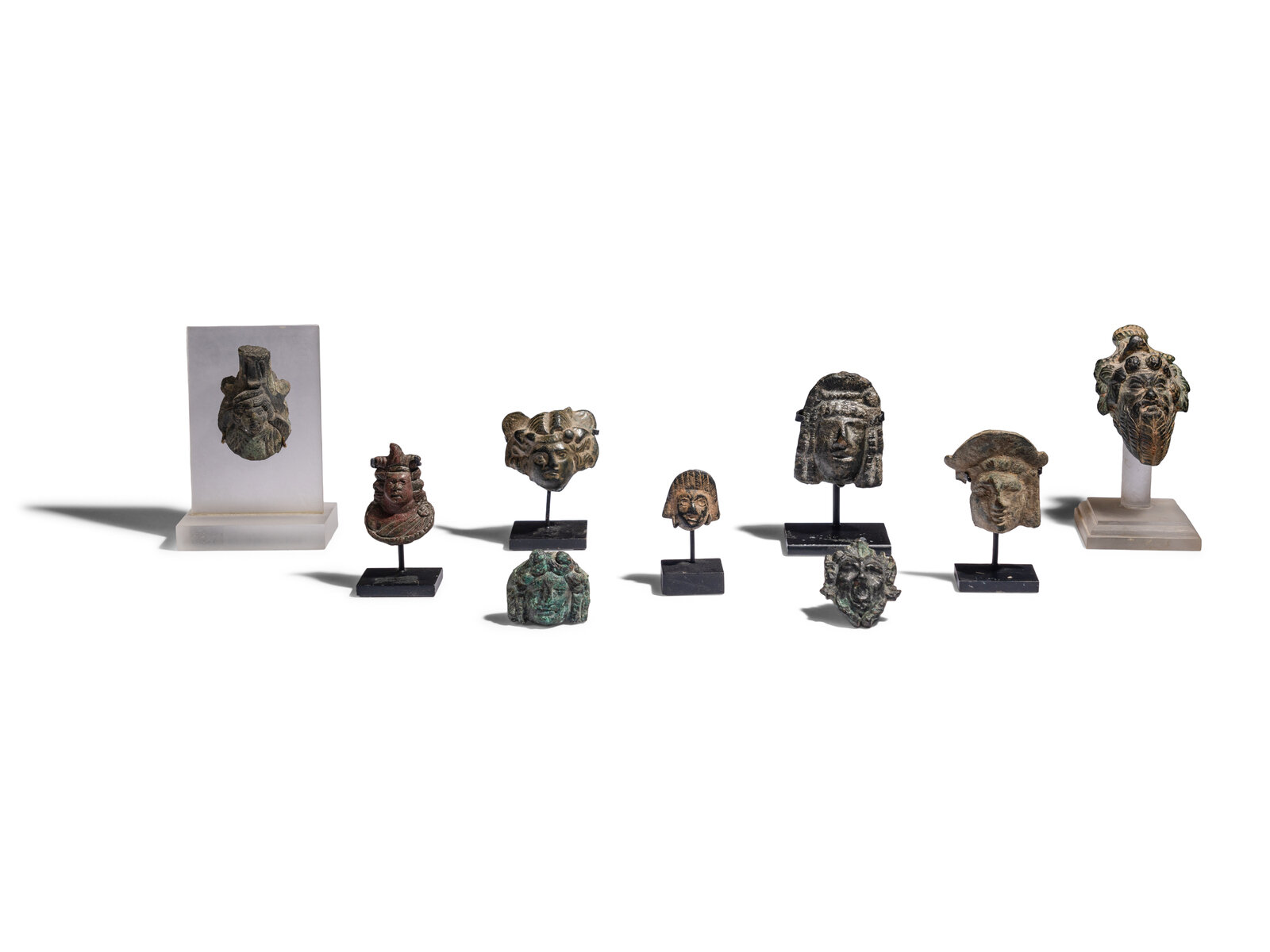 Appraisal: Nine Roman Bronze Masks Circa st- th Century A D