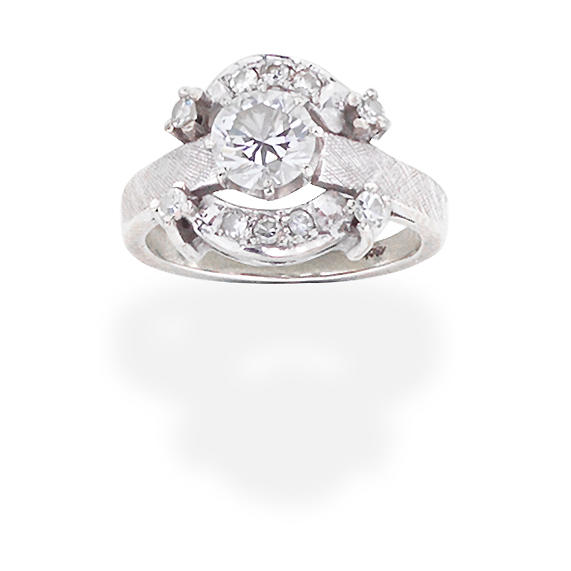 Appraisal: DIAMOND RING Set with a brilliant-cut diamond within a single-cut