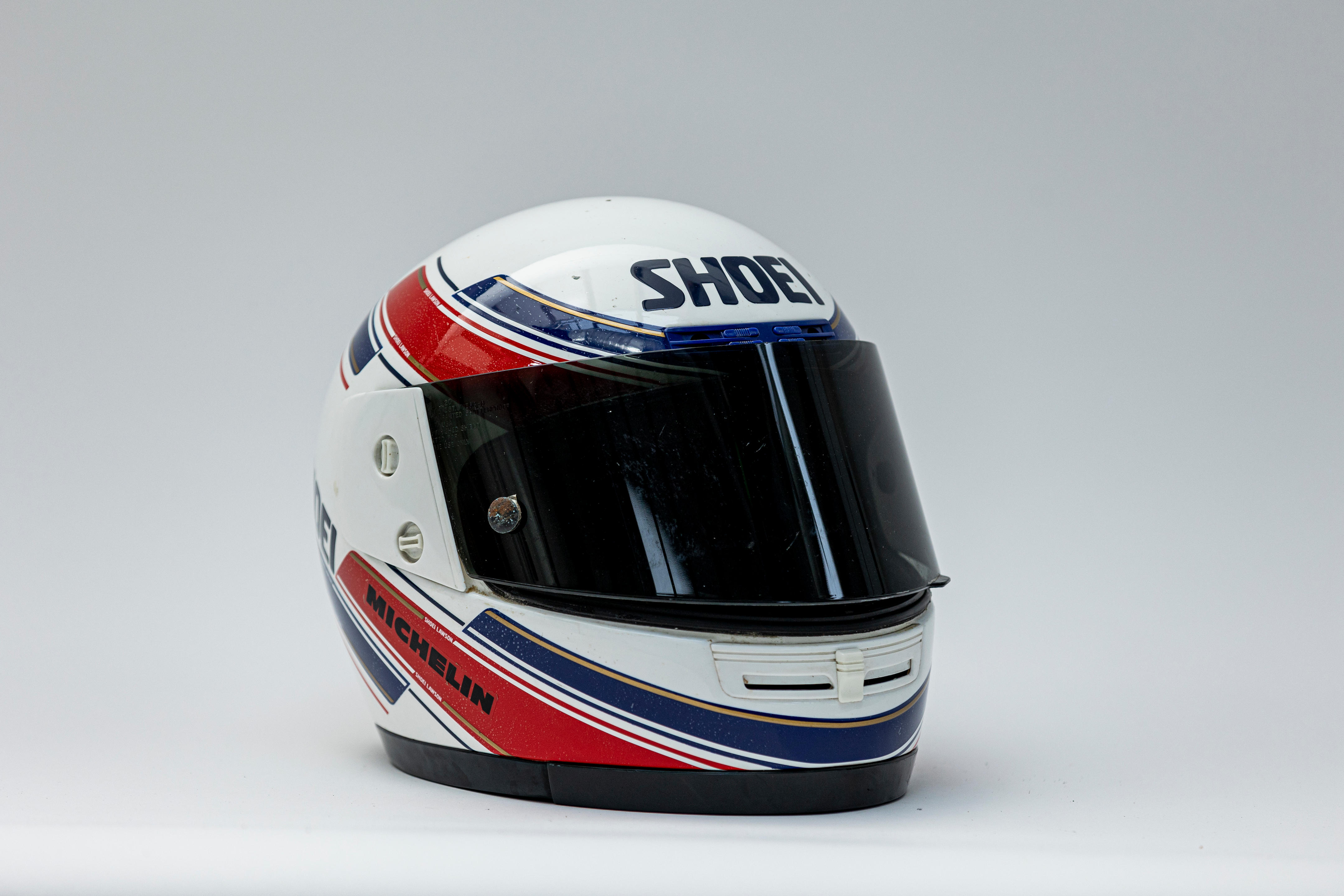 Appraisal: EDDIE LAWSON A FULL-FACE HELMET BY SHOEI size extra small