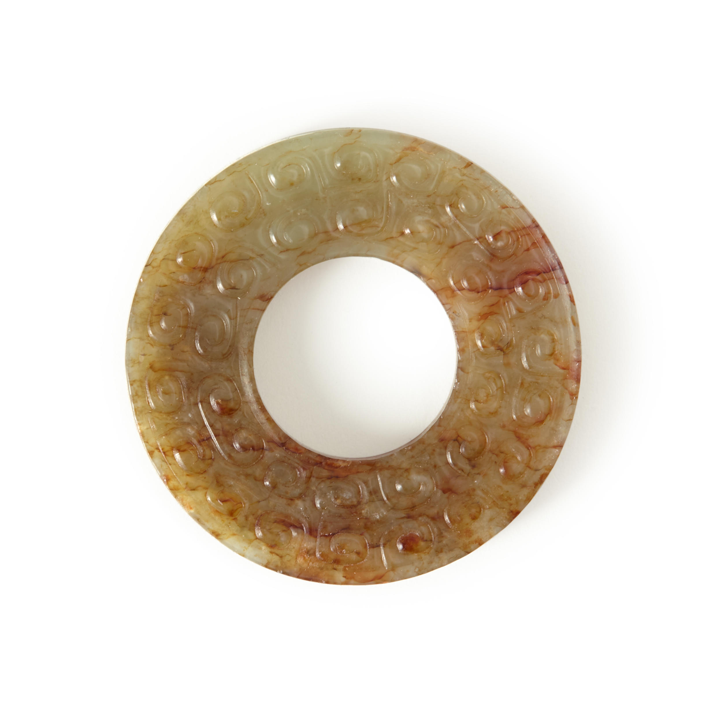 Appraisal: ARCHAISTIC JADE BI DISC China decorated with archaic swirl band