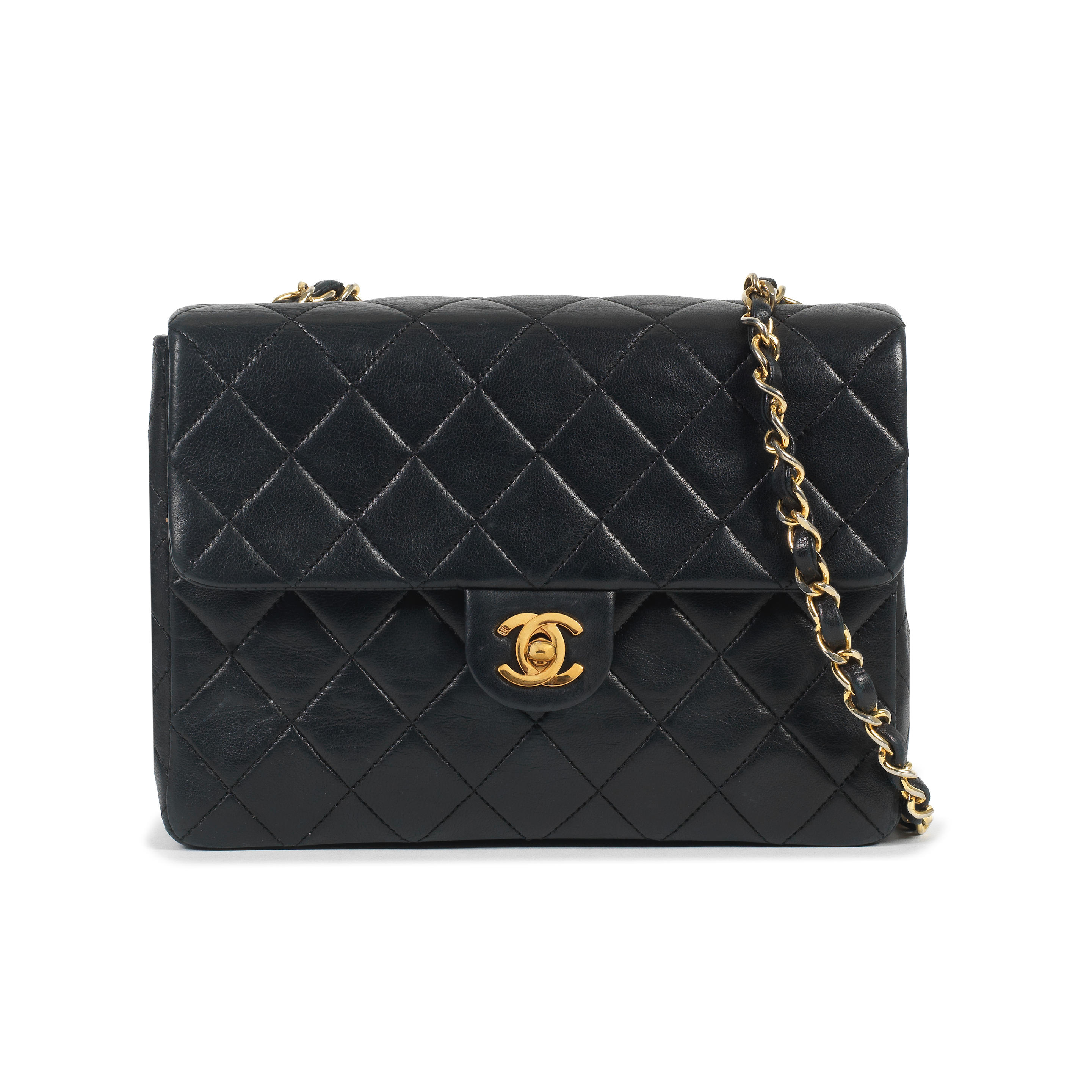 Appraisal: KARL LAGERFELD FOR CHANEL A BLACK LAMBSKIN MINI FLAP BAG