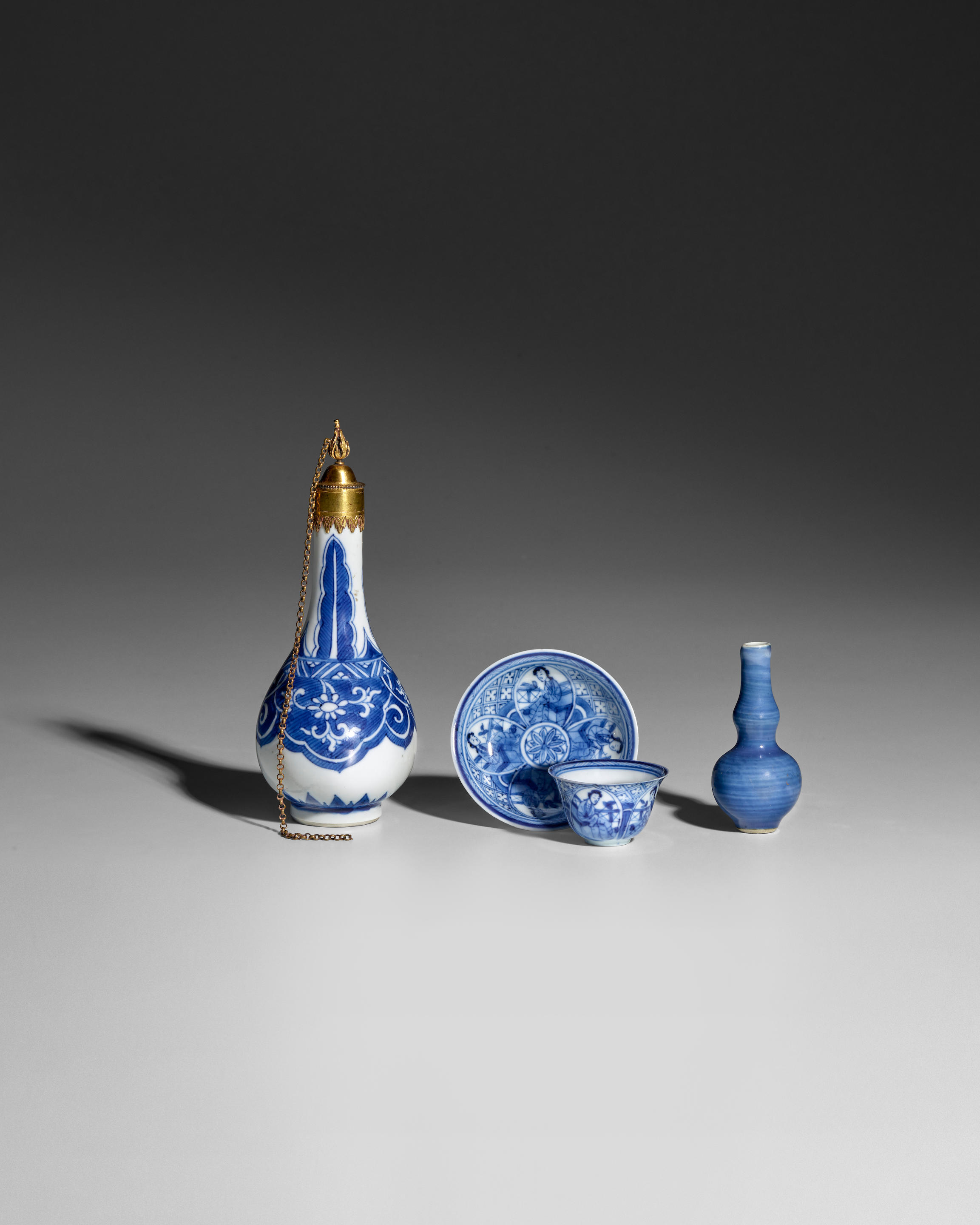 Appraisal: FOUR BLUE AND WHITE WARES Kangxi Comprising a rosewater sprinkler