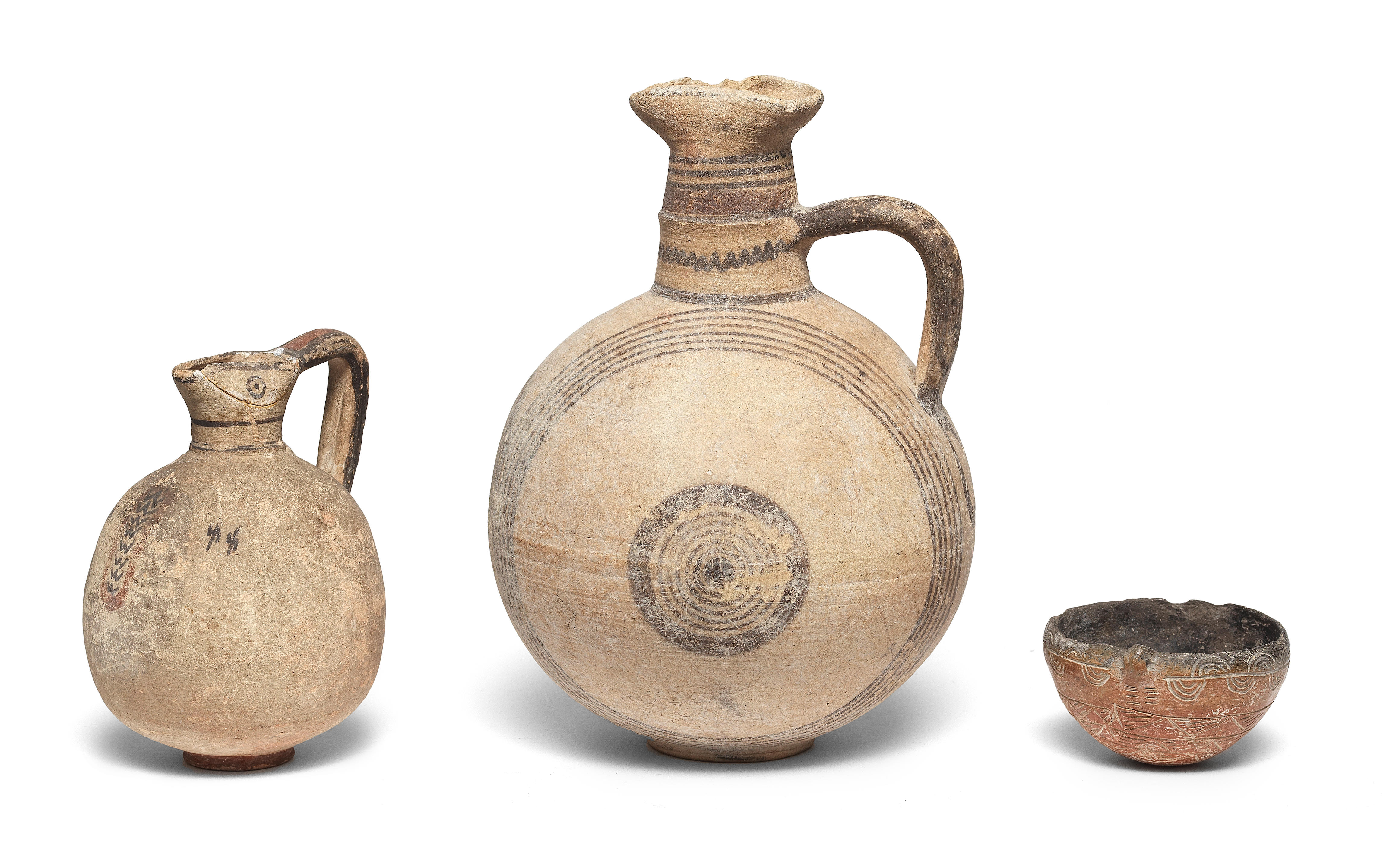 Appraisal: THREE CYPRIOT POTTERY VESSELS Three Cypriot pottery Vessels Bronze Age-Iron