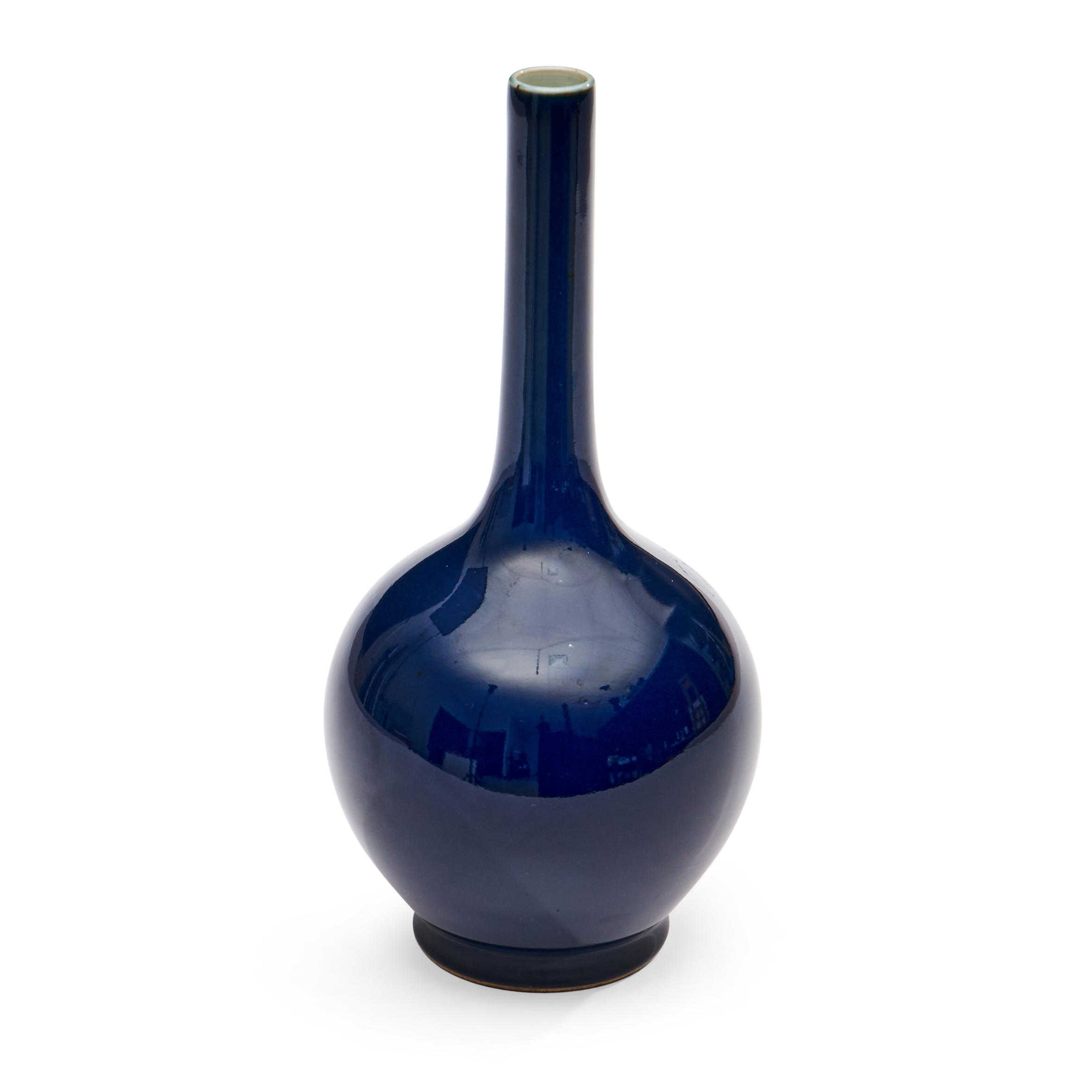 Appraisal: MONOCHROME BLUE-GLAZED BOTTLE VASE China Kangxi style bulbous with a