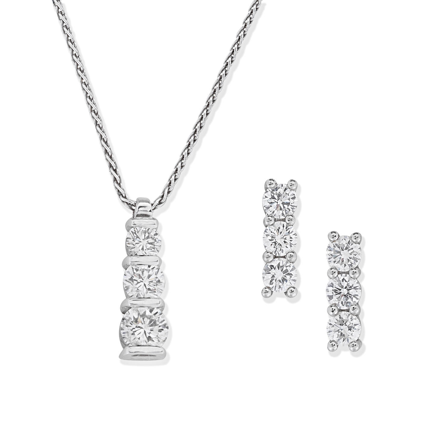 Appraisal: DIAMOND PENDANT NECKLACE AND EARRINGS The pendant set with three