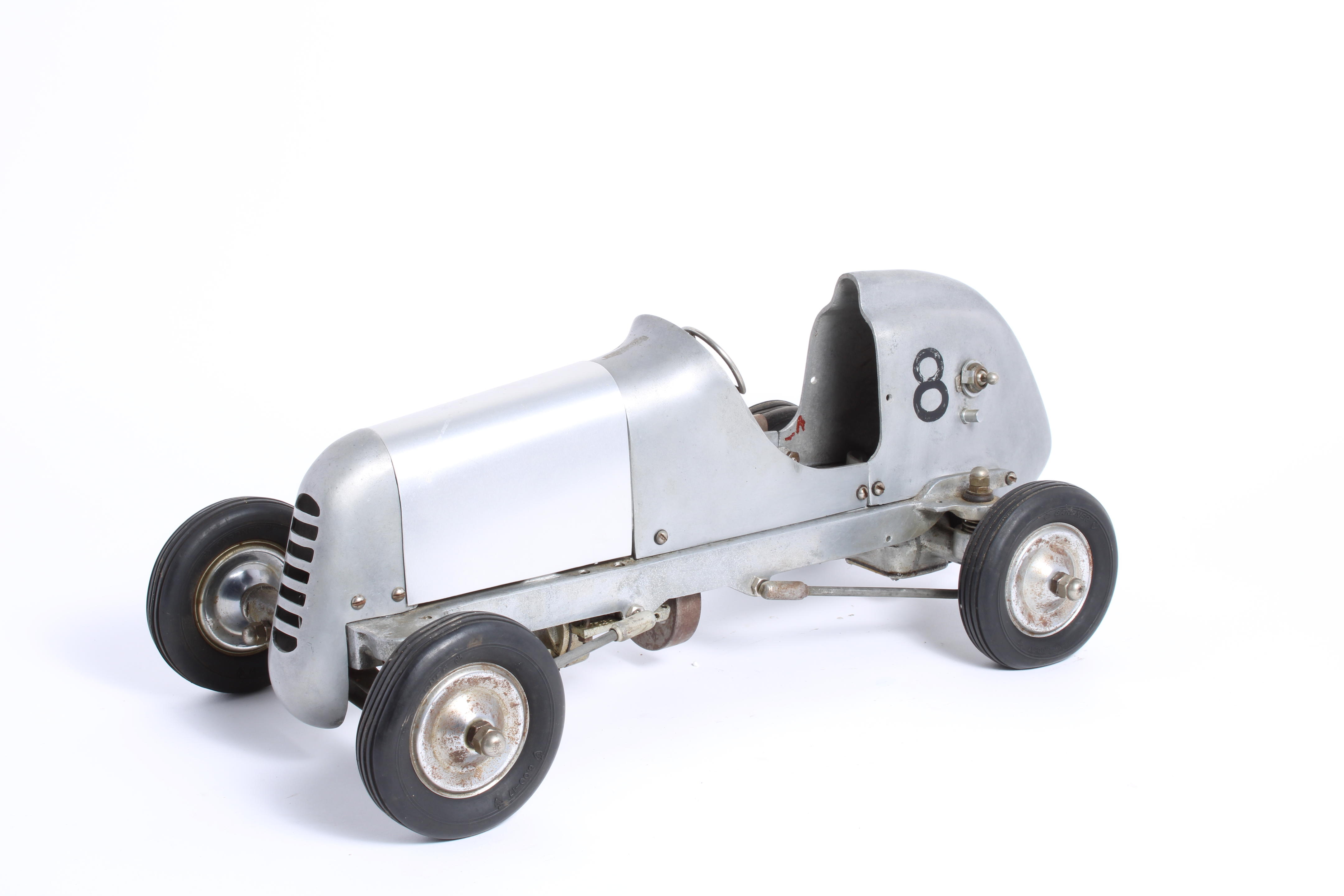 Appraisal: A DOOLING MERCURY REAR DRIVE GAS POWERED TETHER RACE CAR