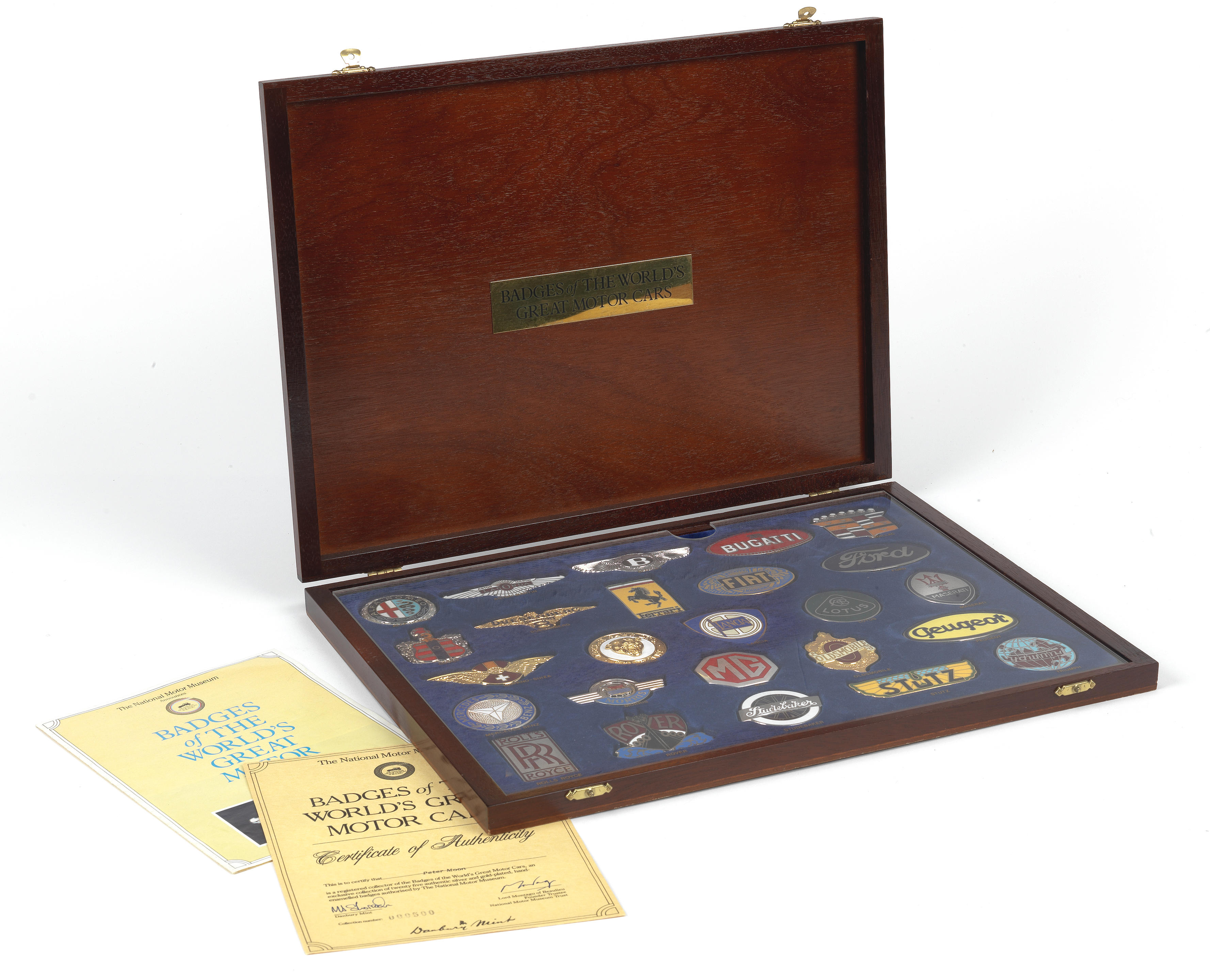 Appraisal: A CASED SET OF 'BADGES OF THE WORLD'S GREAT MOTOR