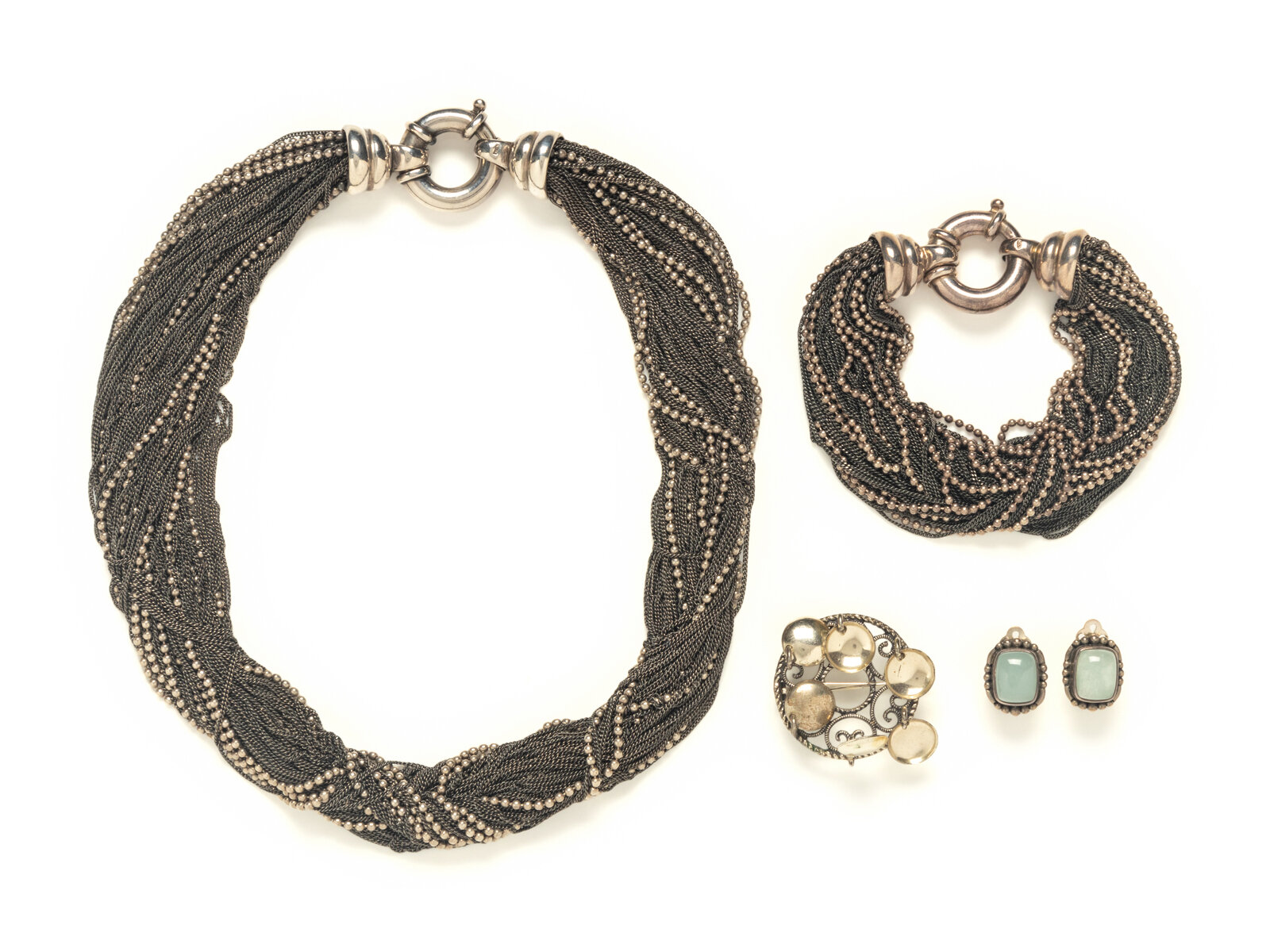 Appraisal: FOUR PIECES OF SILVER JEWELRY THE FIRST A matching set