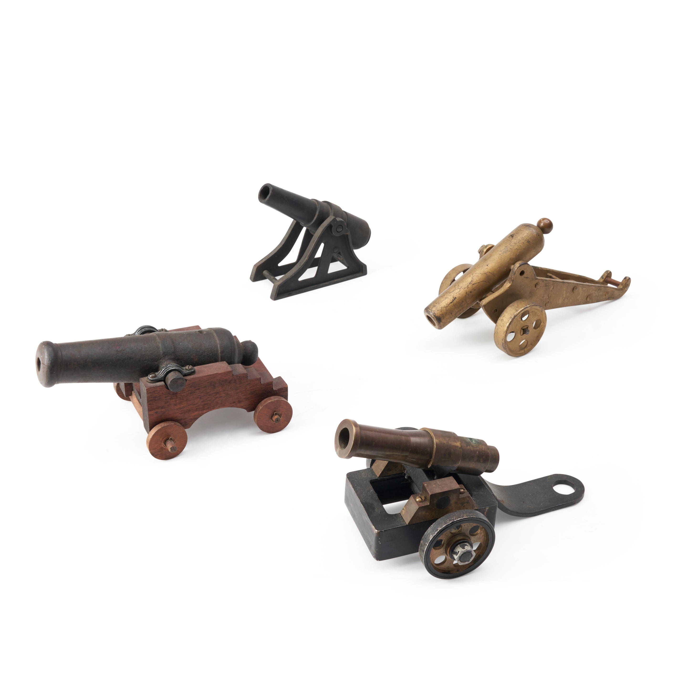 Appraisal: FOUR MINIATURE CANNON TH TH CENTURY Including two on field-type