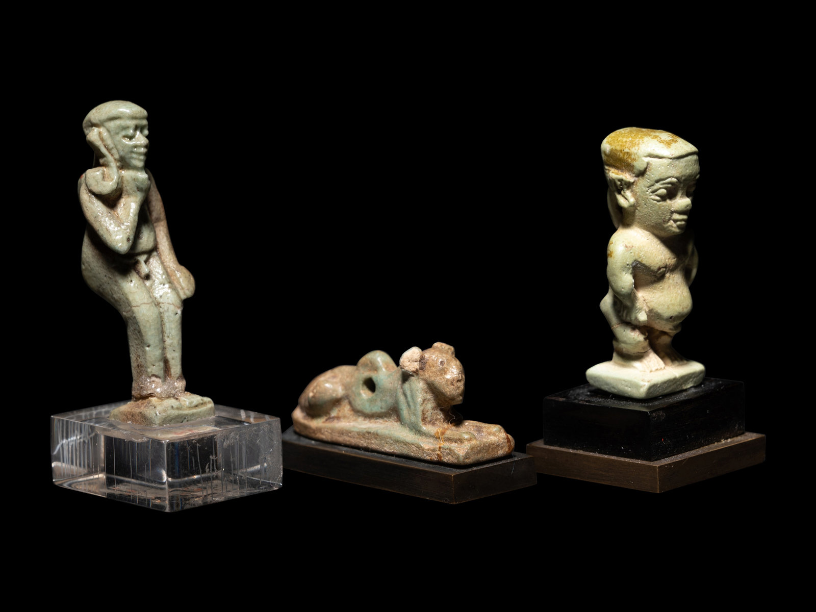 Appraisal: Three Egyptian Faience Amulets Including a Pataikos a Harpocrates and