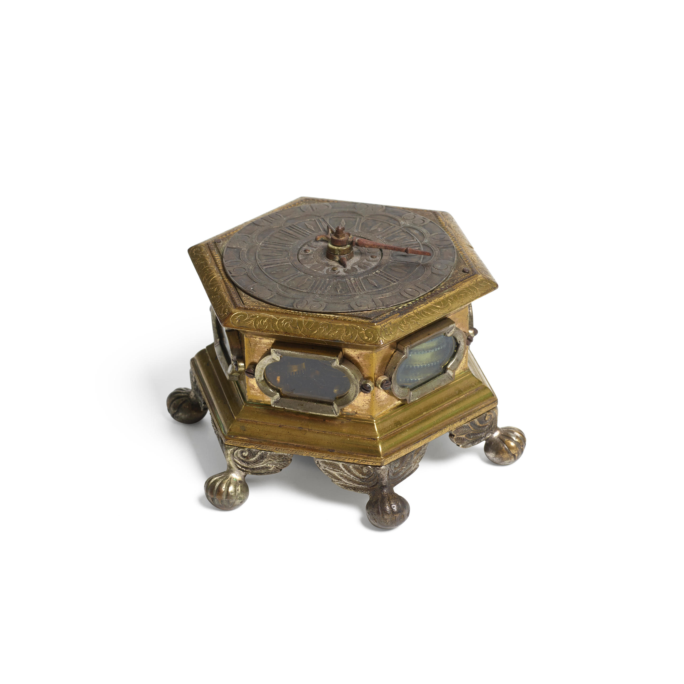 Appraisal: A SMALL GERMAN GILT AND SILVERED BRASS HEXAGONAL TABLE CLOCK