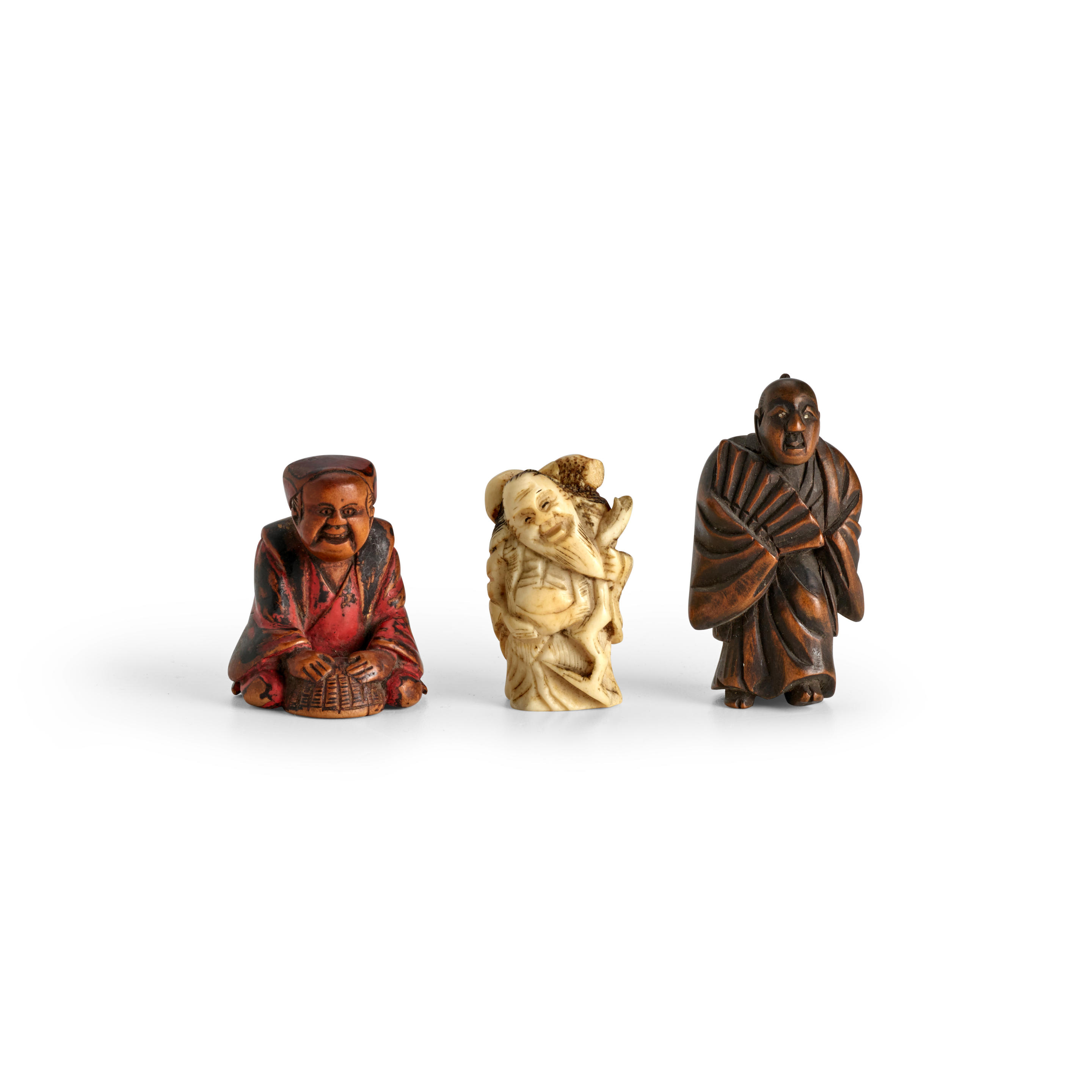 Appraisal: A GROUP OF THREE NETSUKE OF VARIOUS MATERIALS Edo period