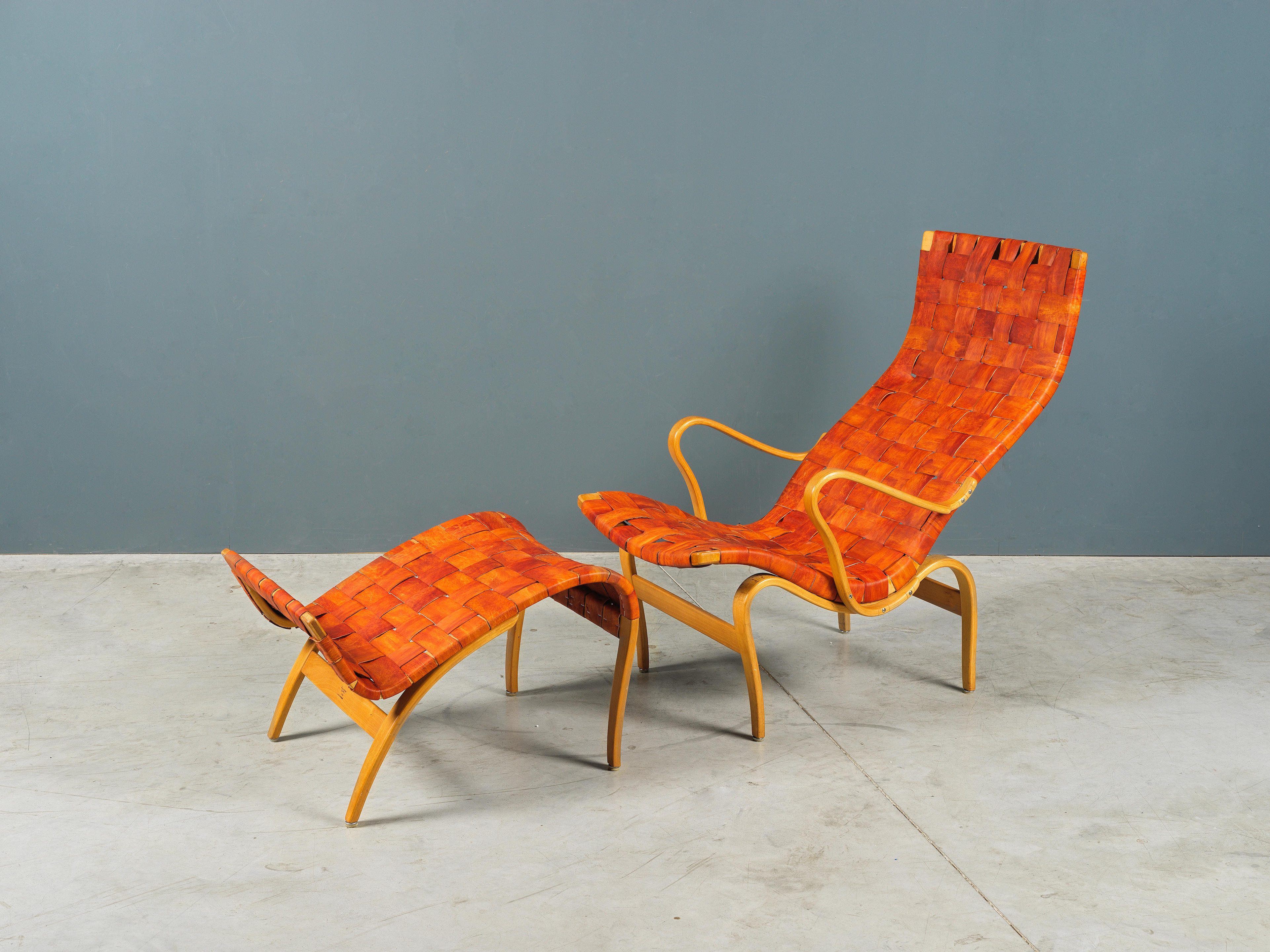 Appraisal: BRUNO MATHSSON - Fauteuil et ottoman Pernilla Cr ation en