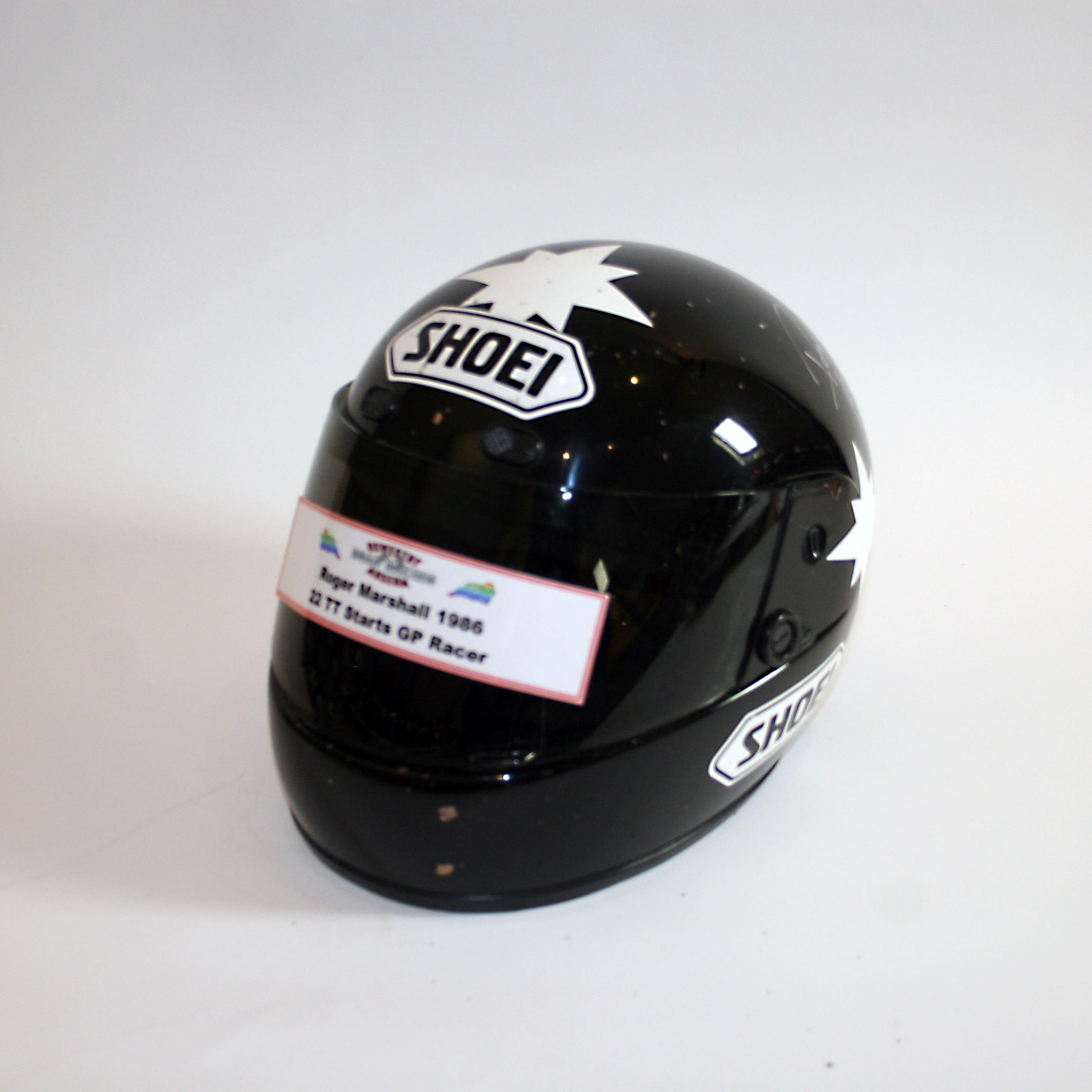 Appraisal: ROGER MARSHALL A SIGNED FULL-FACE HELMET BY SHOEI used and