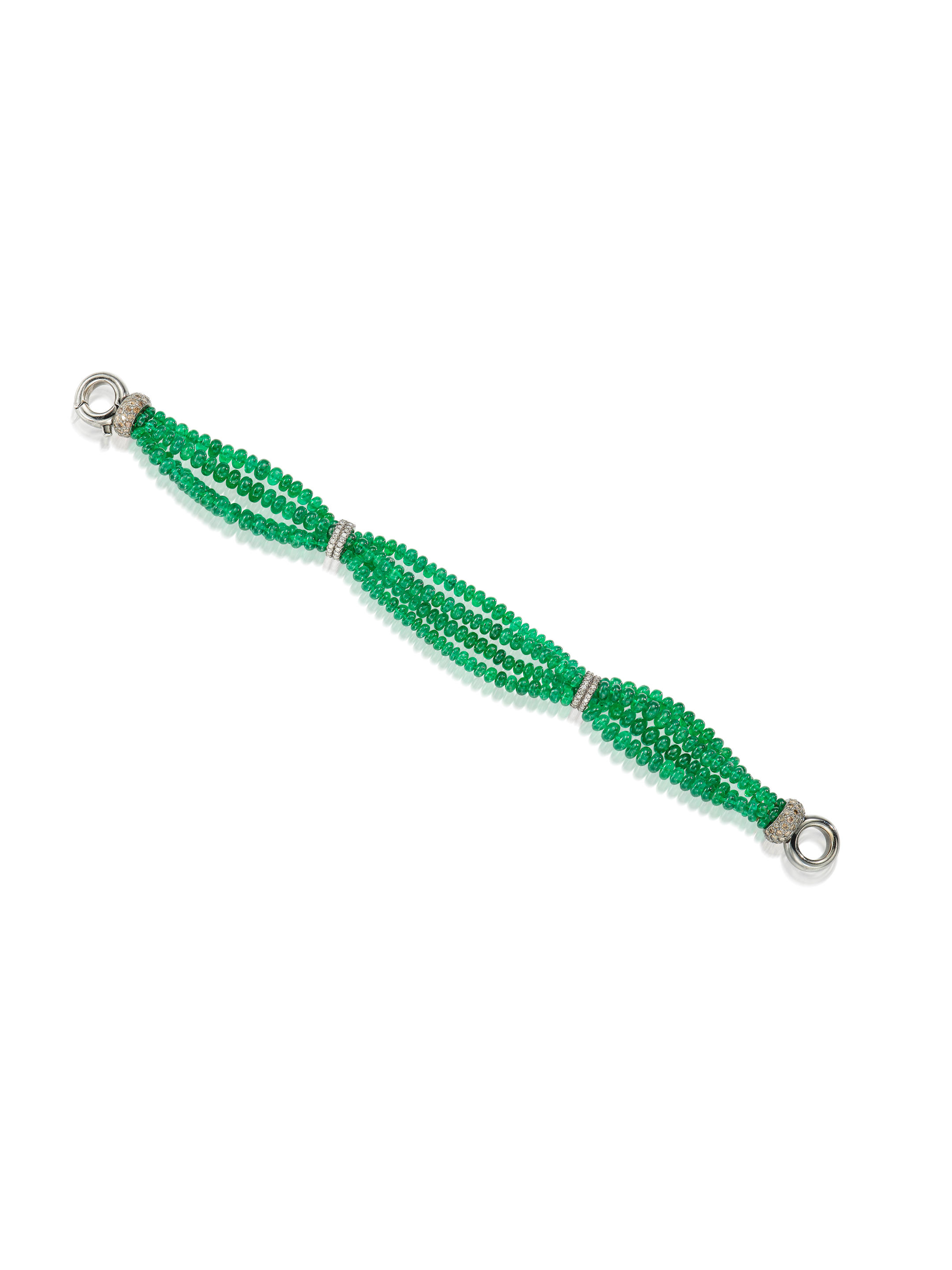 Appraisal: AN EMERALD COLOURED DIAMOND AND DIAMOND BRACELET Composed of a