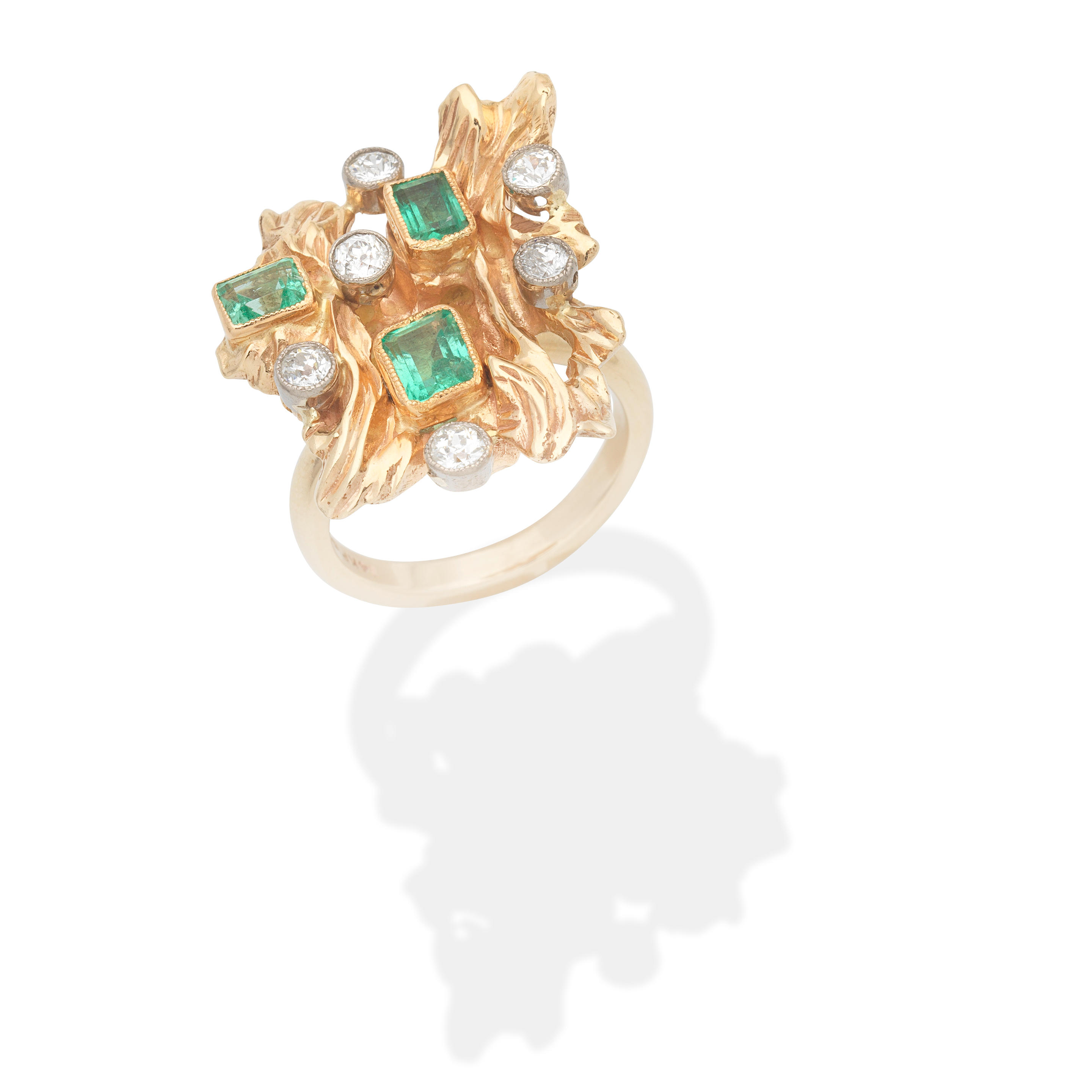 Appraisal: EMERALD AND DIAMOND RING Step-cut emeralds Old brilliant-cut diamonds approx