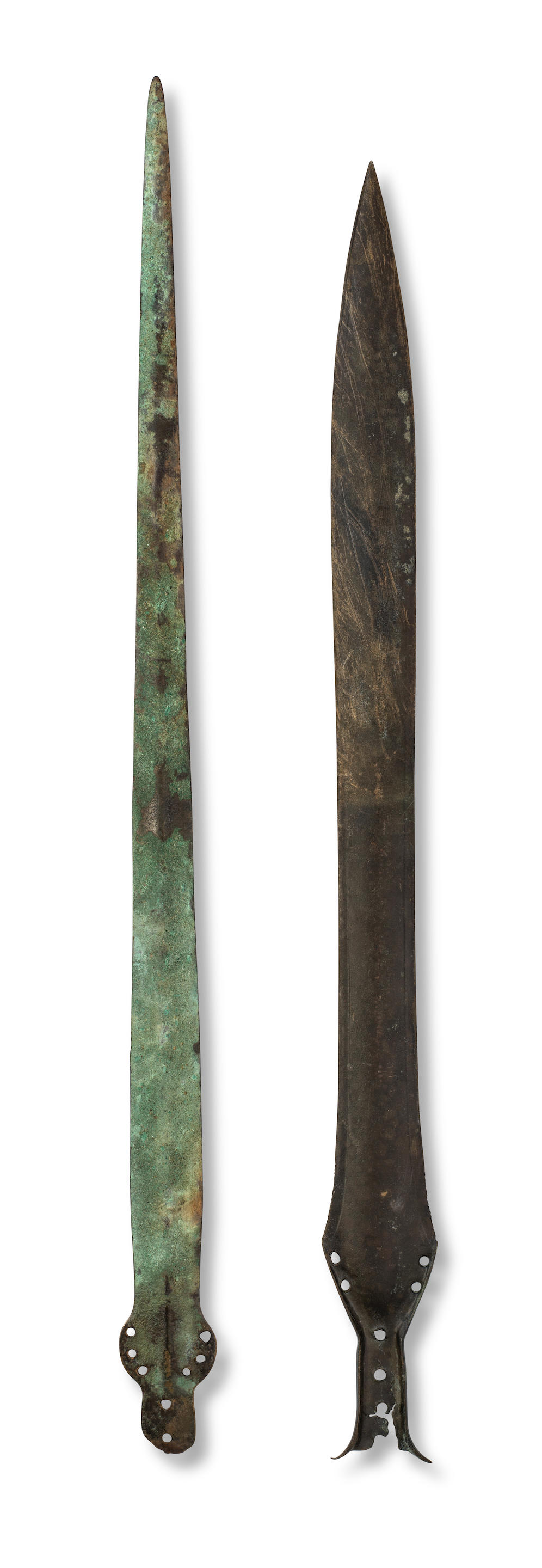 Appraisal: TWO EUROPEAN BRONZE SWORDS Two European bronze swords Late Bronze