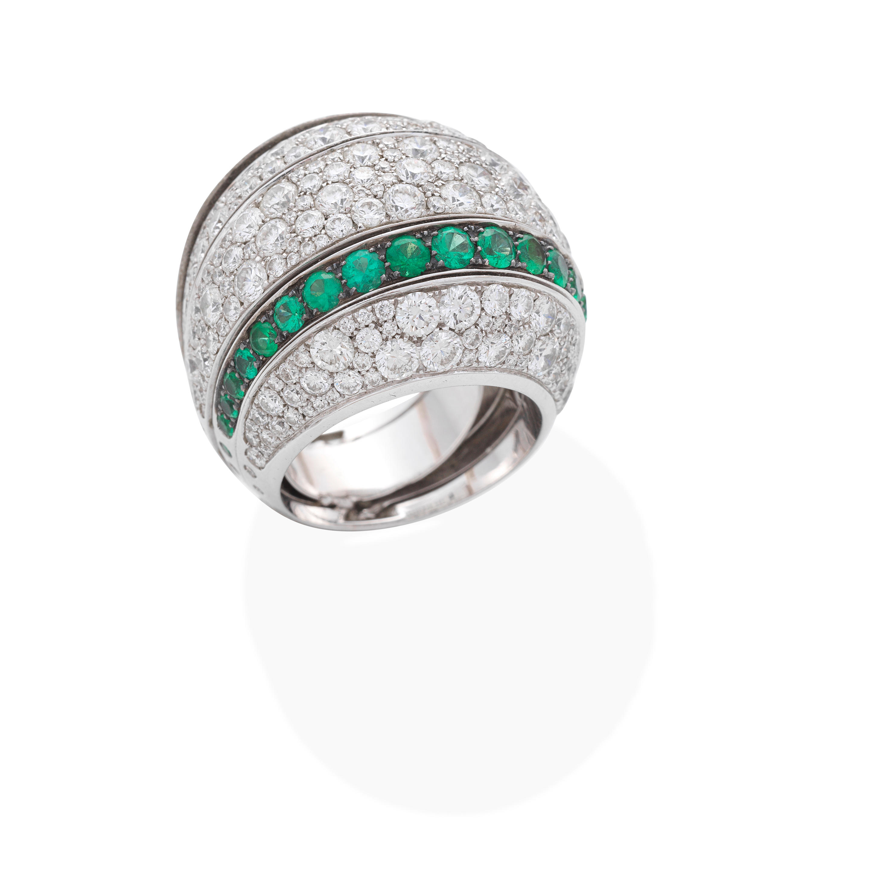 Appraisal: DE GRISOGONO 'JIA' DIAMOND AND EMERALD RING Brilliant-cut diamonds and