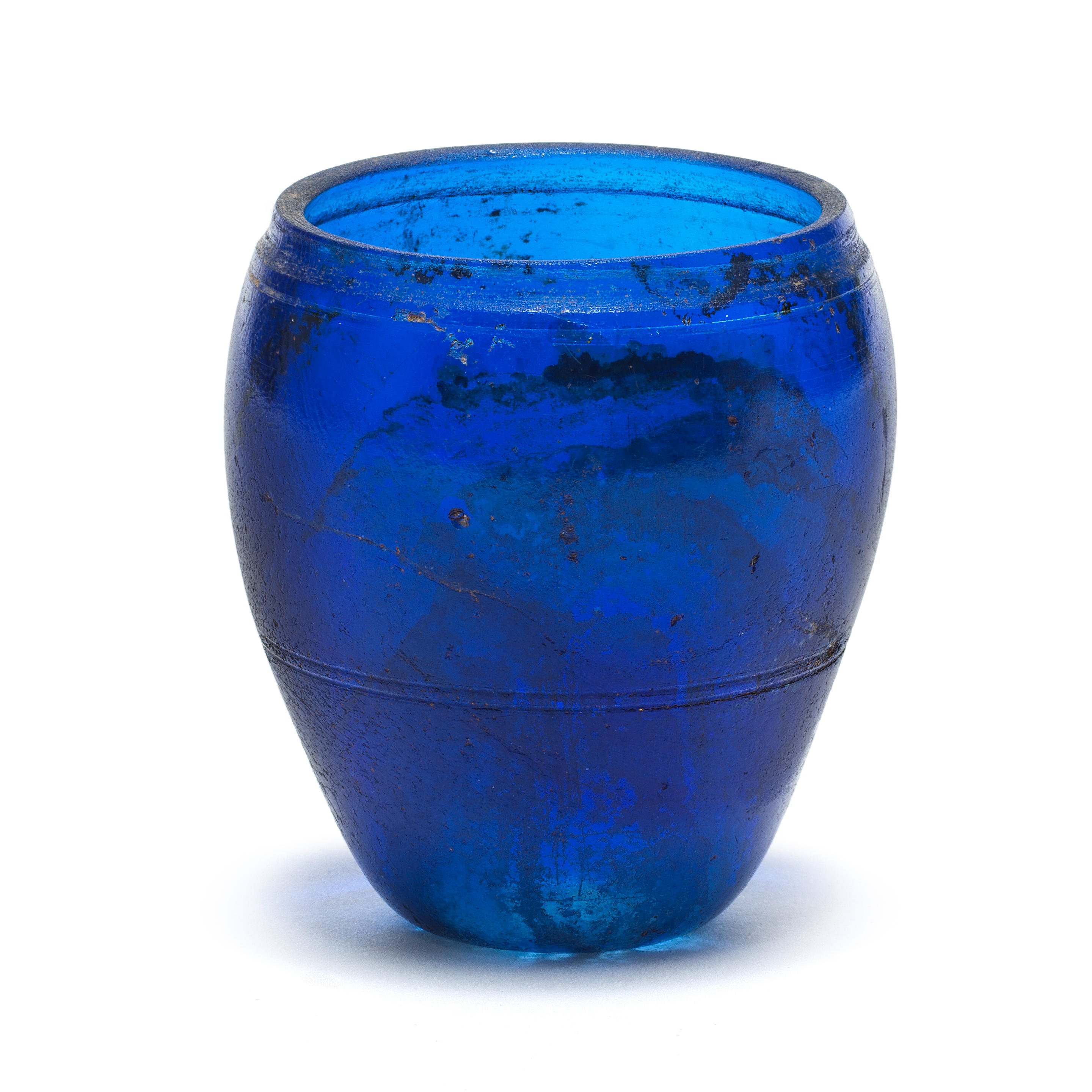 Appraisal: A HELLENISTIC COBALT BLUE GLASS BEAKER WITH WHEEL-CUT BANDS A