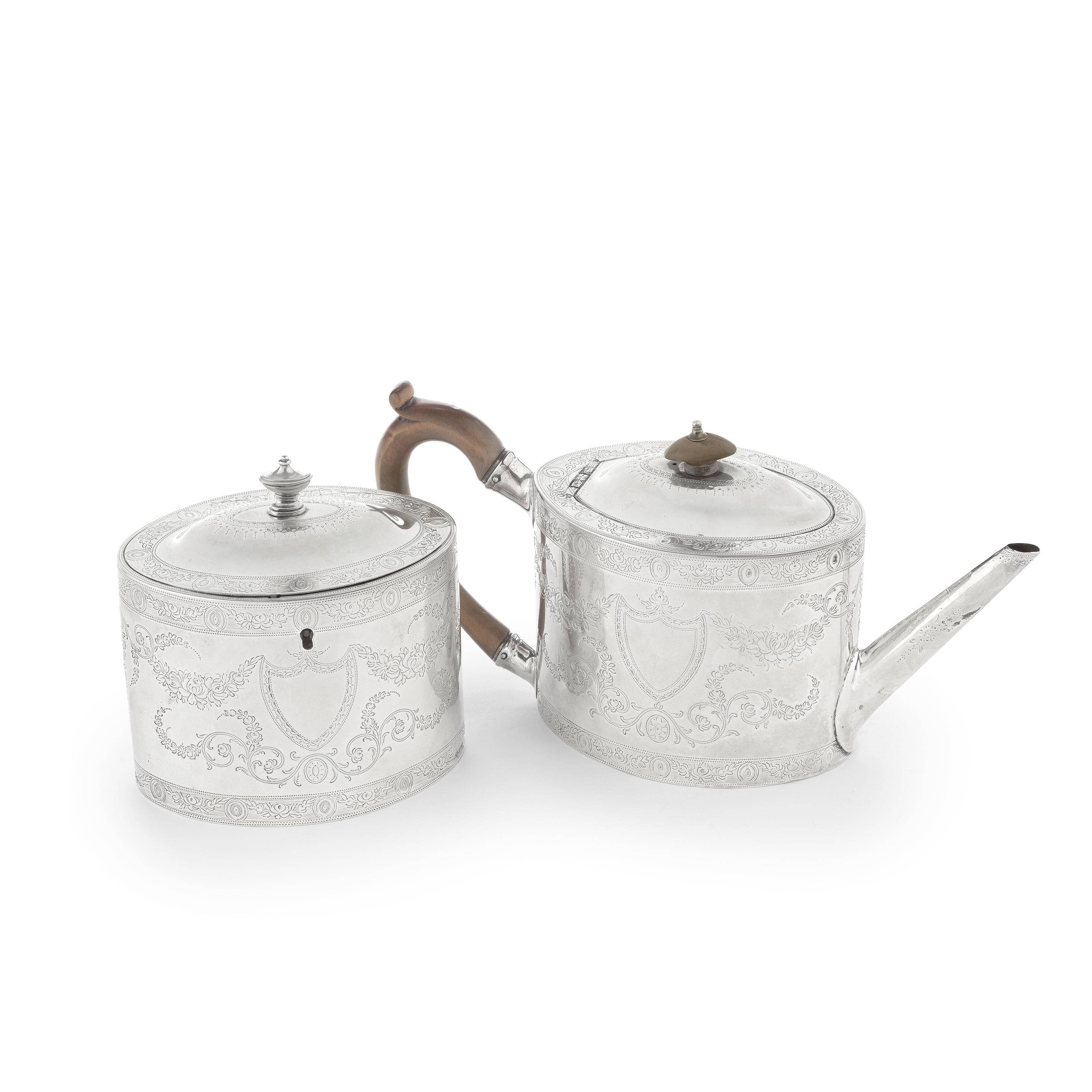 Appraisal: A GEORGE III SILVER TEAPOT AND MATCHING TEA CADDY Henry