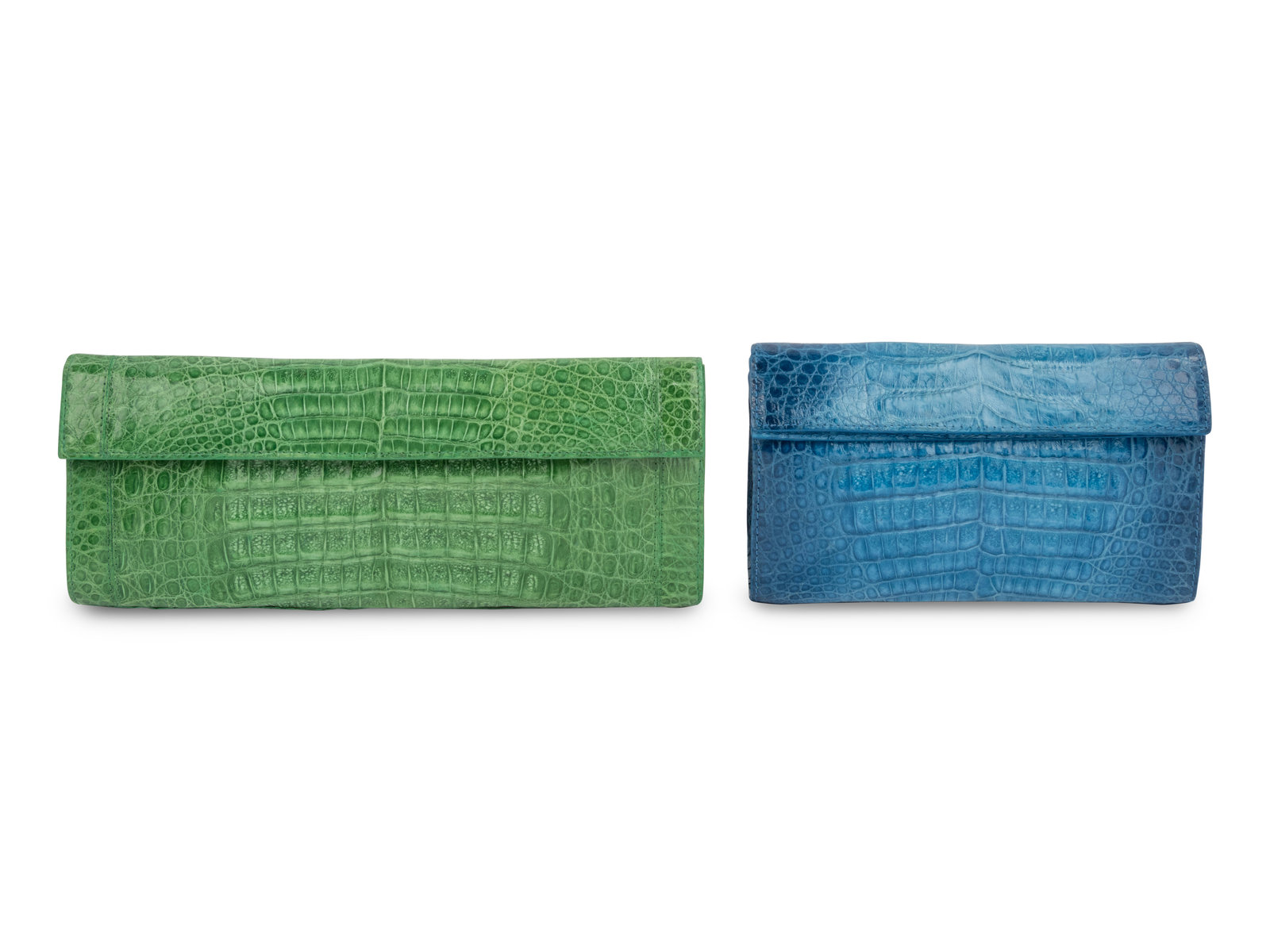 Appraisal: Two Nancy Gonzalez Crocodile Clutches THE FIRST Green crocodile rectangular