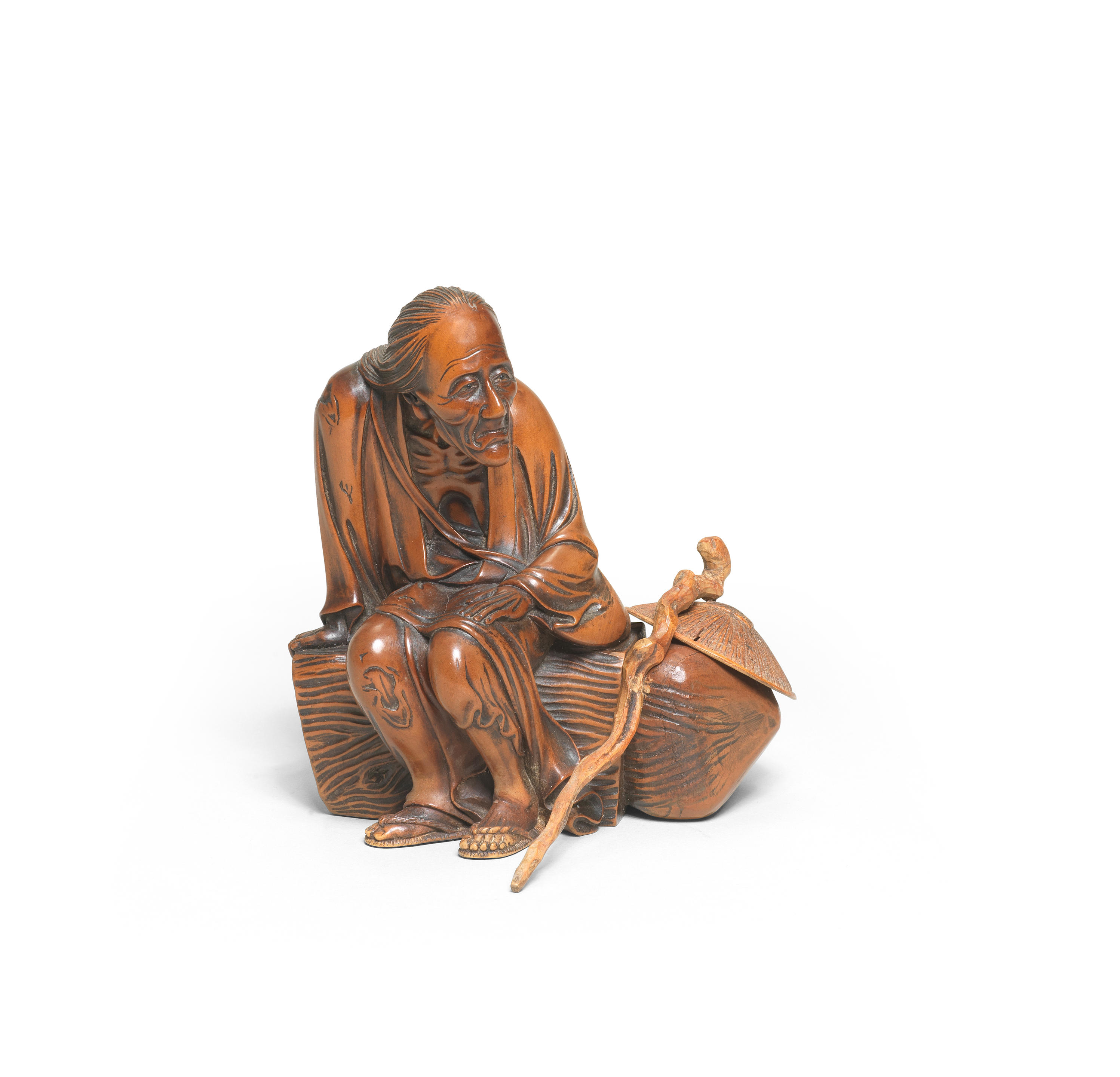 Appraisal: A WOOD OKIMONO TABLE ORNAMENT OF AN ELDERLY WOMAN Edo