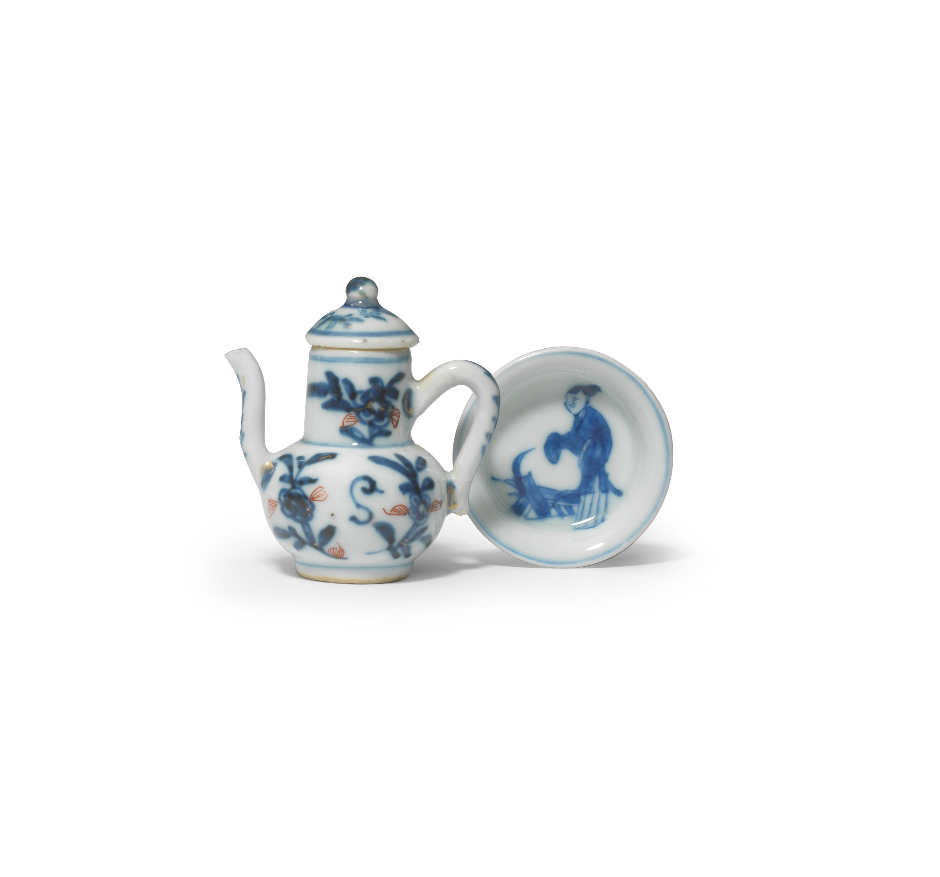 Appraisal: A MINIATURE BLUE AND WHITE AND COPPER-RED 'S A' EWER