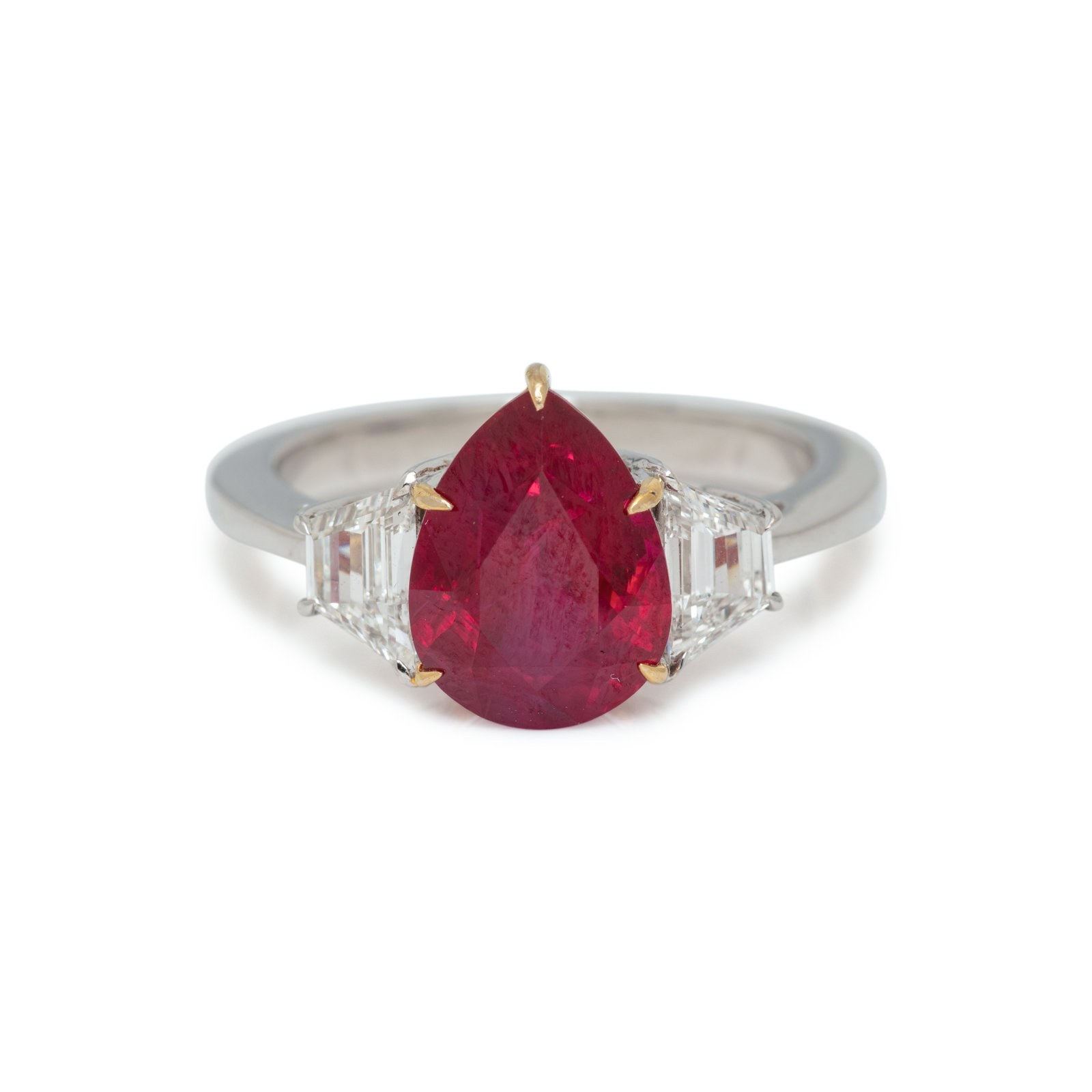 Appraisal: BURMESE RUBY AND DIAMOND RING Containing one pear shaped ruby