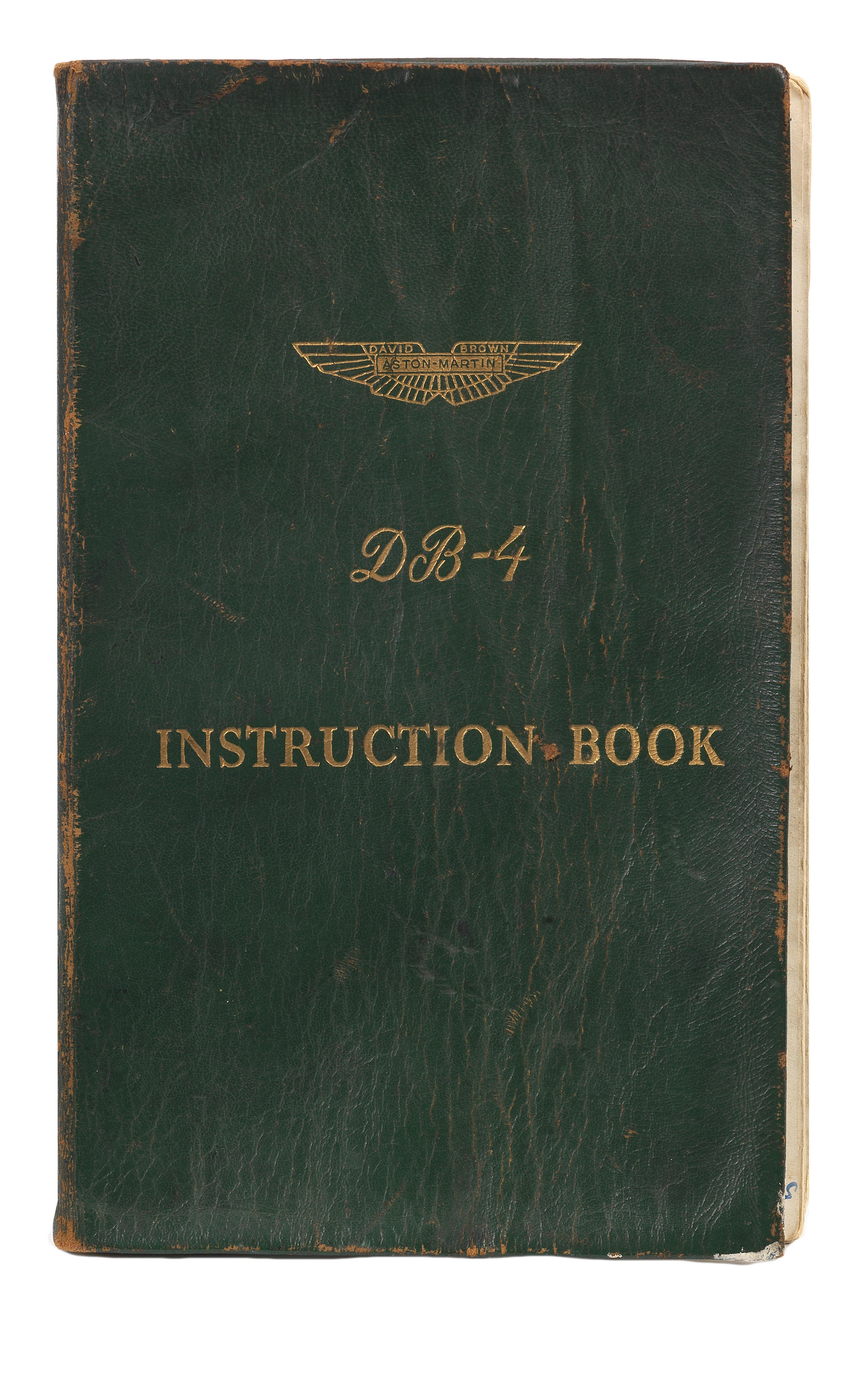 Appraisal: AN ASTON MARTIN DB INSTRUCTION BOOK green leather covers numbered