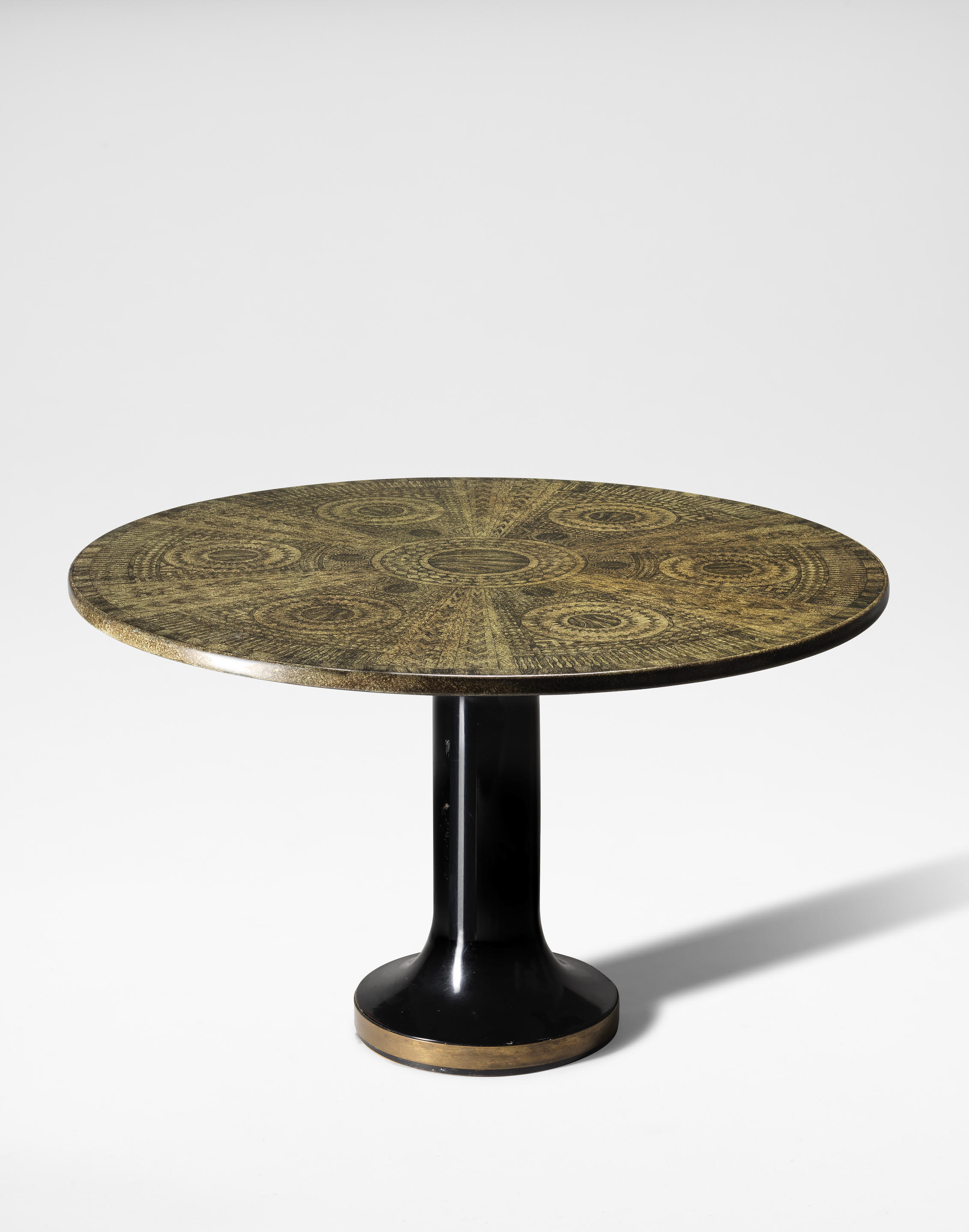 Appraisal: PIERO FORNASETTI 'Geometrico Bruno' dining table circa Lithographic transfer-printed steel