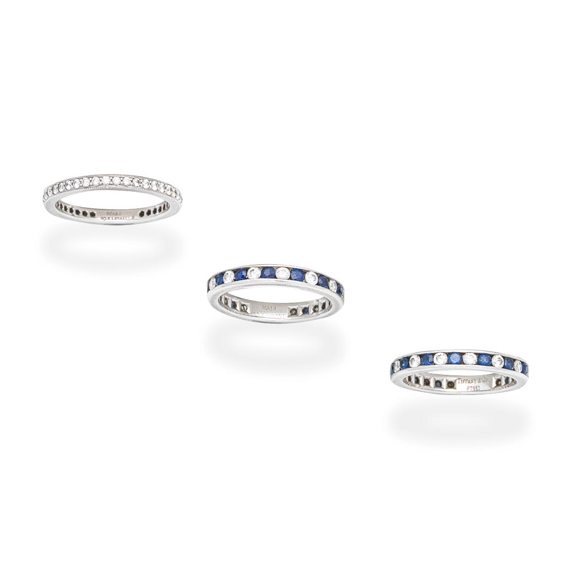 Appraisal: TIFFANY TWO SAPPHIRE AND DIAMOND ETERNITY RINGS DIAMOND ETERNITY RING