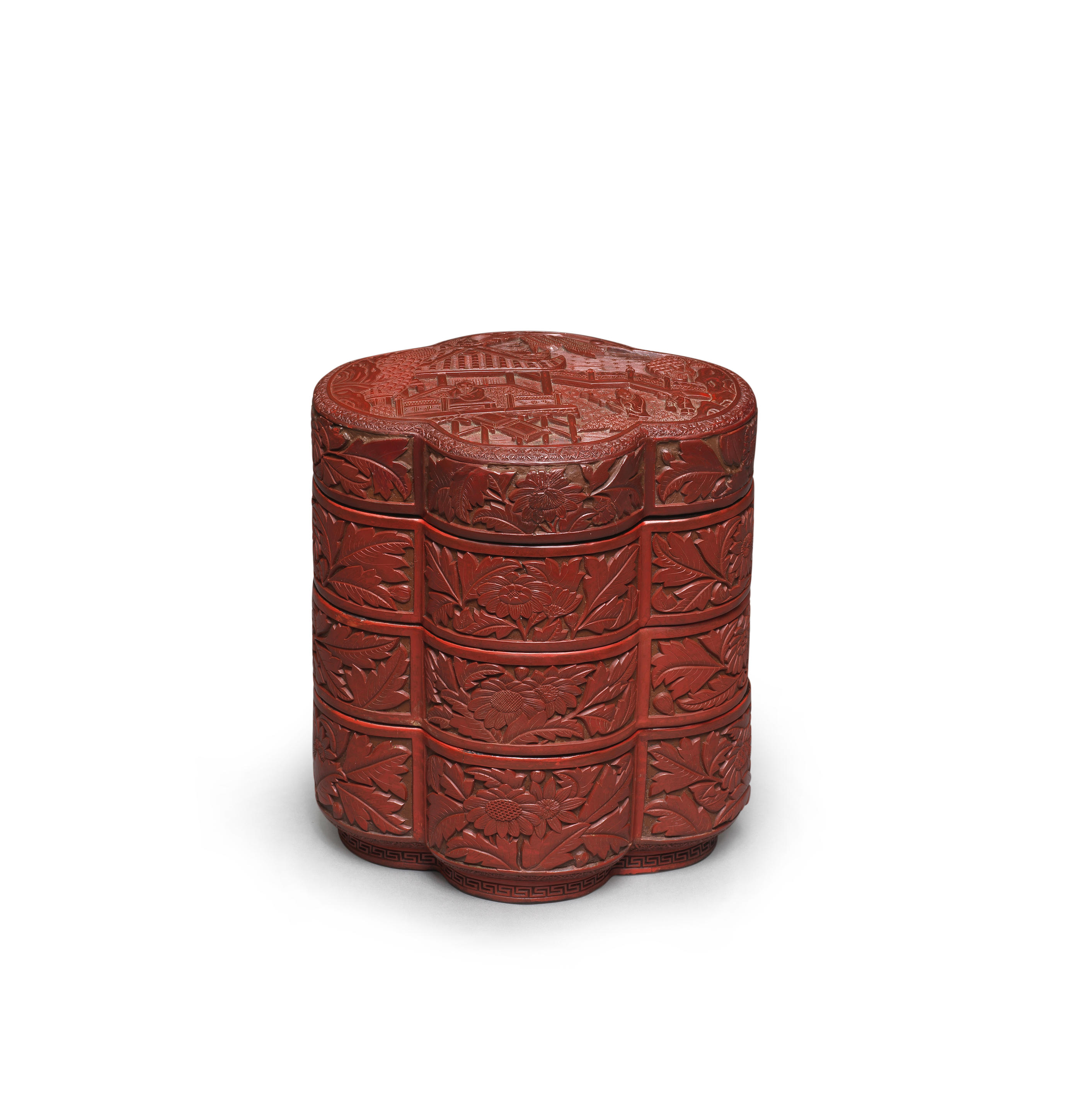 Appraisal: A THREE-TIER CARVED CINNABAR LACQUER QUATREFOIL BOX AND COVER th