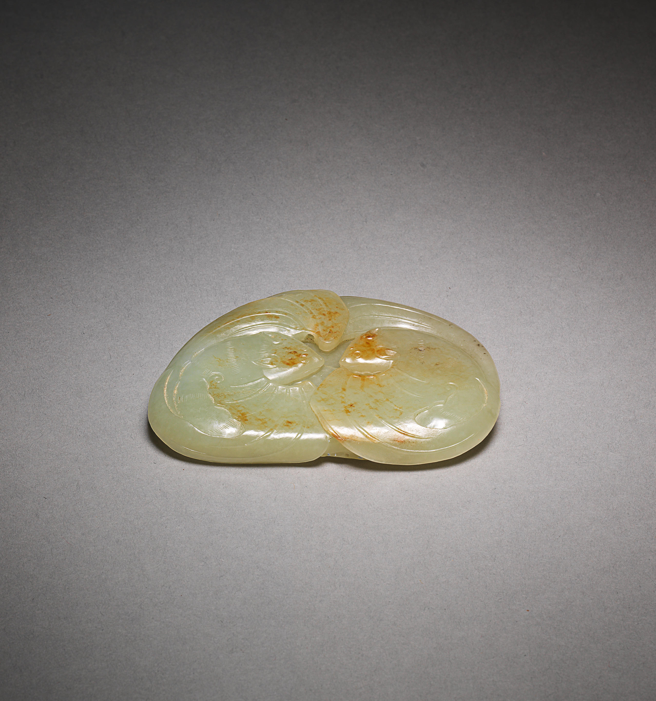 Appraisal: A PALE-GREEN JADE 'FIVE BATS' SCROLL-WEIGHT th century The flattened