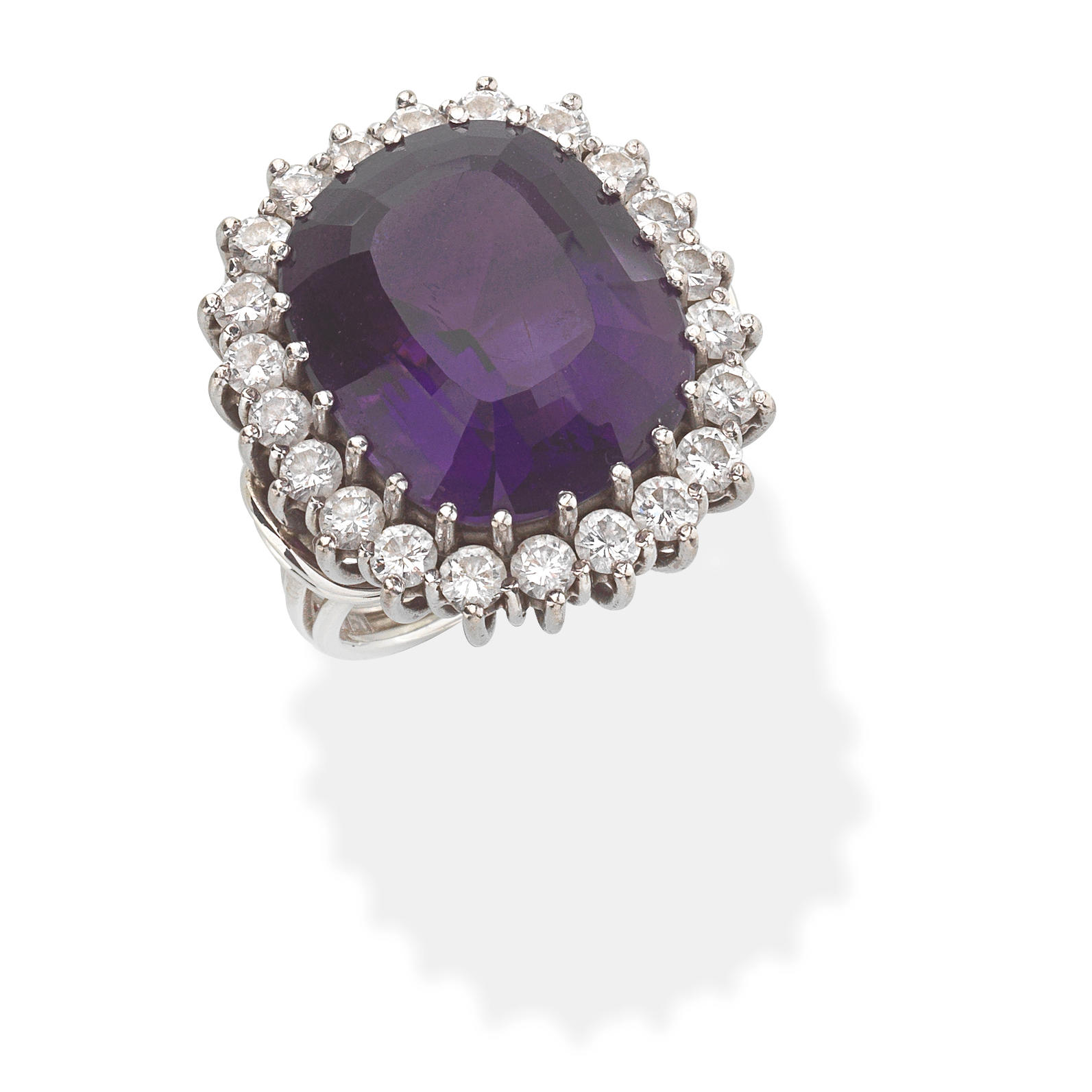 Appraisal: AMETHYST AND DIAMOND RING Cushion-shaped amethyst and brilliant-cut diamonds amethyst