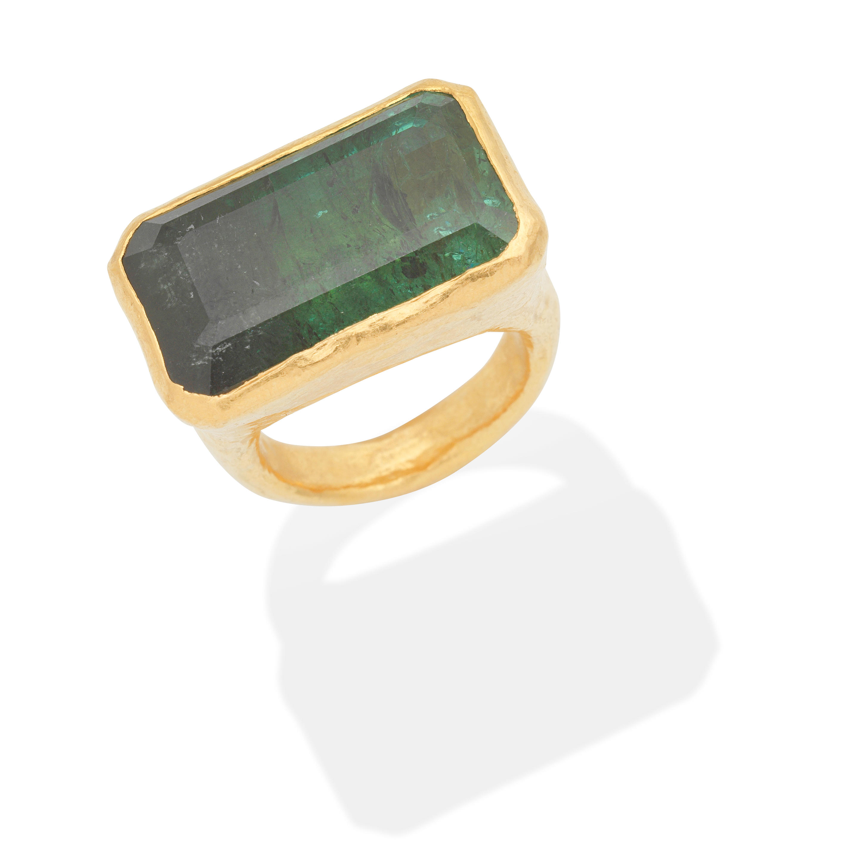 Appraisal: RAM TOURMALINE DRESS RING Step-cut green tourmaline Unsigned Ring size