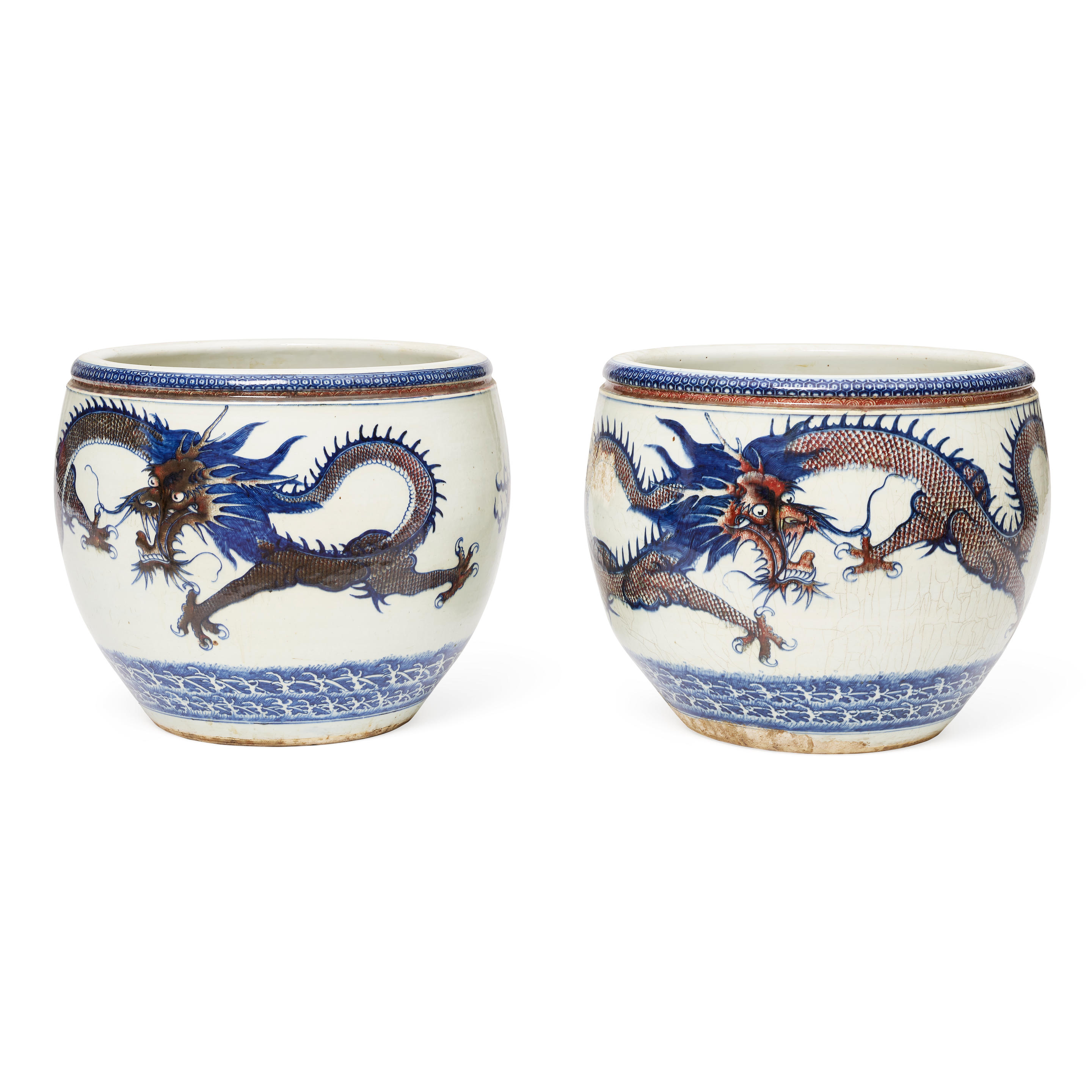 Appraisal: A PAIR OF CHINESE COPPER-RED AND UNDERGLAZE-BLUE PORCELAIN 'DRAGON' JARDINI